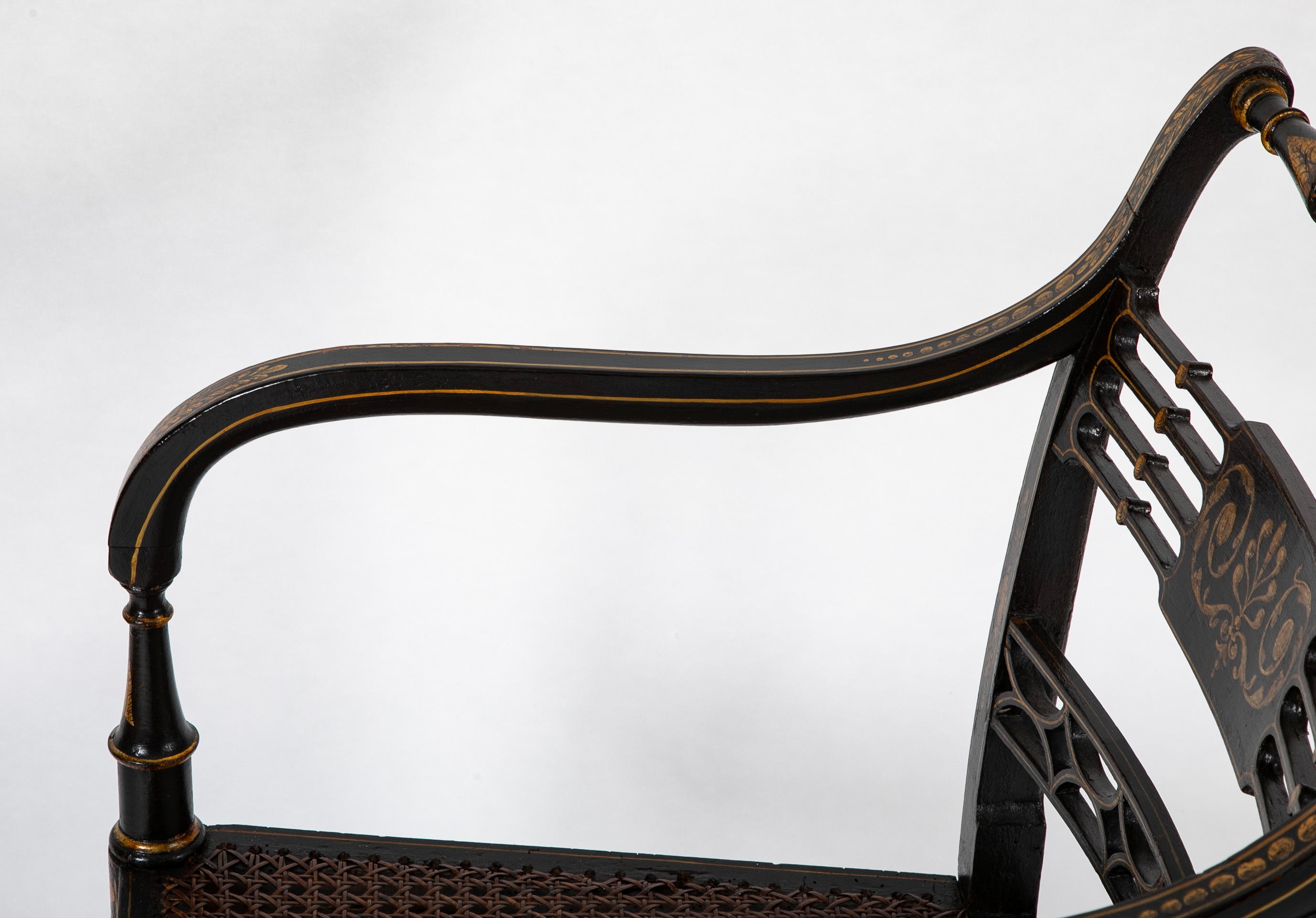 Pair of Regency Ebonized Caned Seat Armchairs