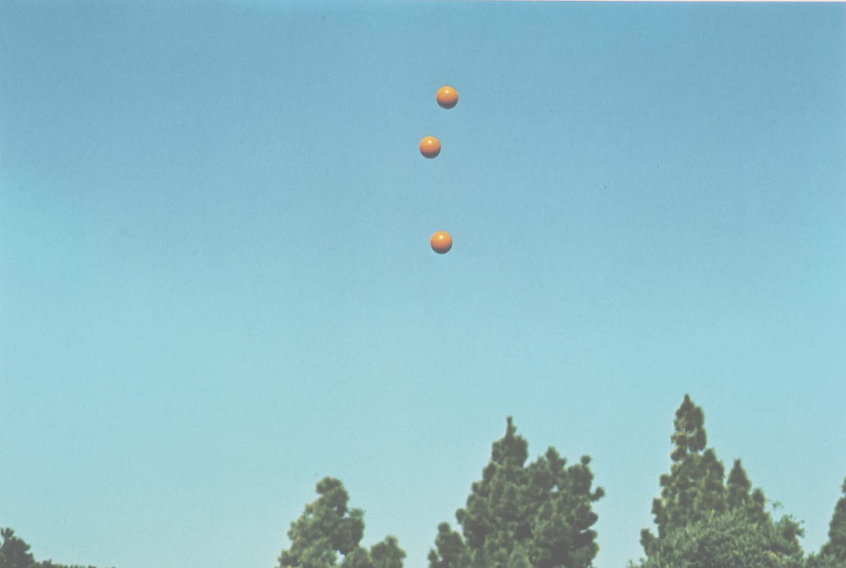 John Baldessari "Throwing Three Balls in the Air to get a Straight Line" , 1973