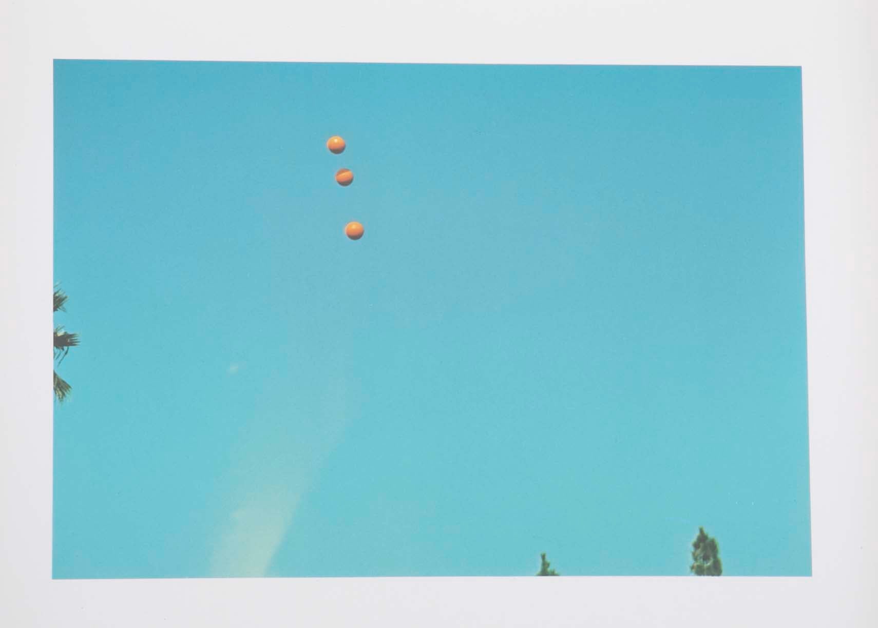 John Baldessari "Throwing Three Balls in the Air to get a Straight Line" , 1973