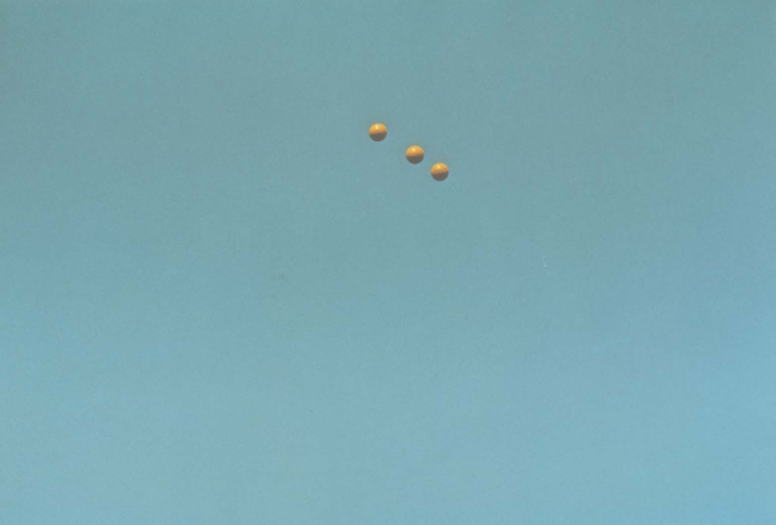 John Baldessari "Throwing Three Balls in the Air to get a Straight Line" , 1973