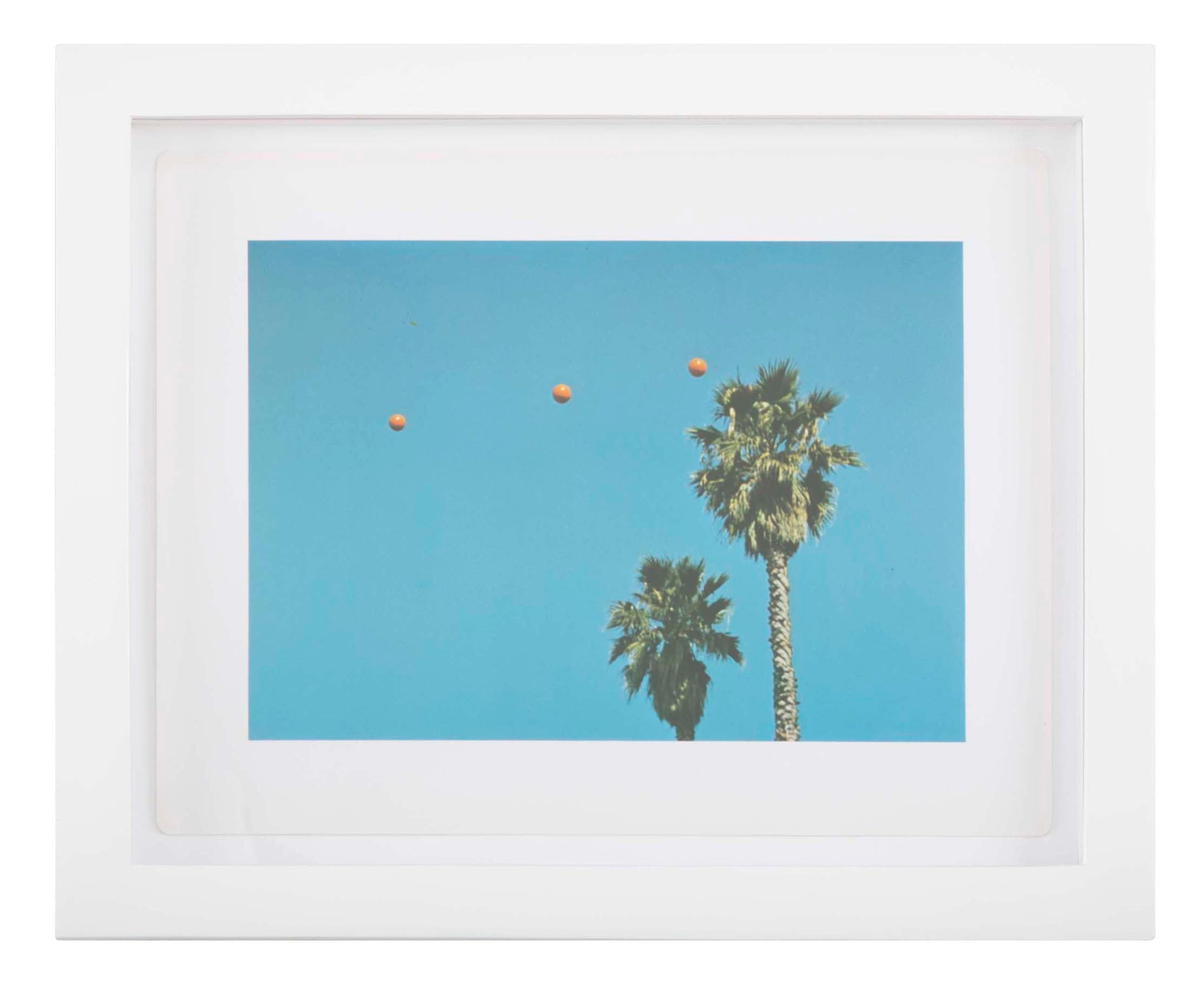 John Baldessari "Throwing Three Balls in the Air to get a Straight Line" , 1973