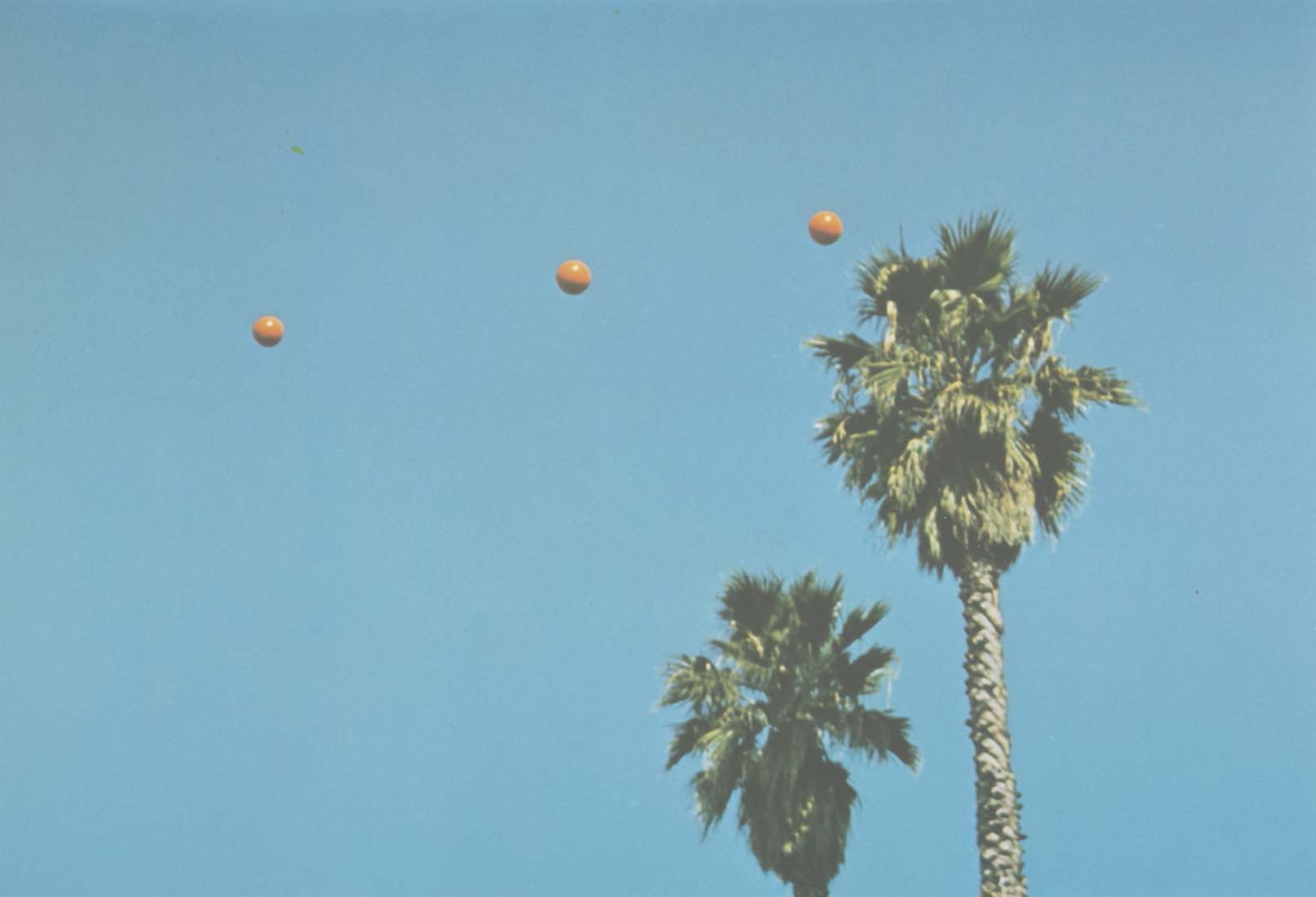 John Baldessari "Throwing Three Balls in the Air to get a Straight Line" , 1973