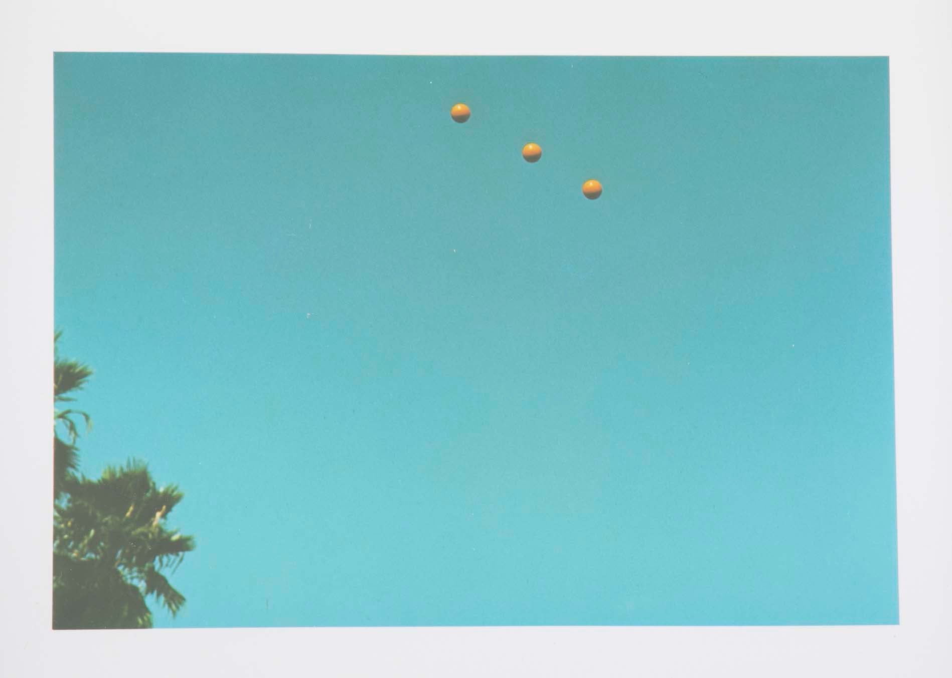 John Baldessari "Throwing Three Balls in the Air to get a Straight Line" , 1973