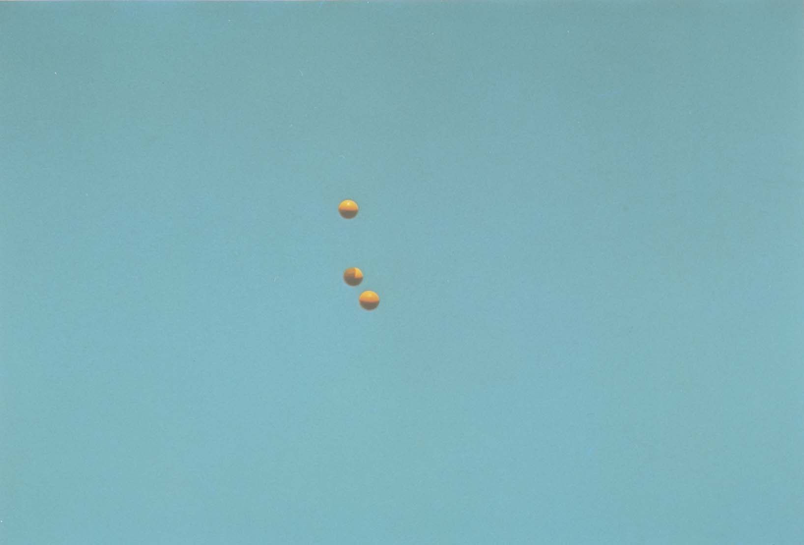 John Baldessari "Throwing Three Balls in the Air to get a Straight Line" , 1973