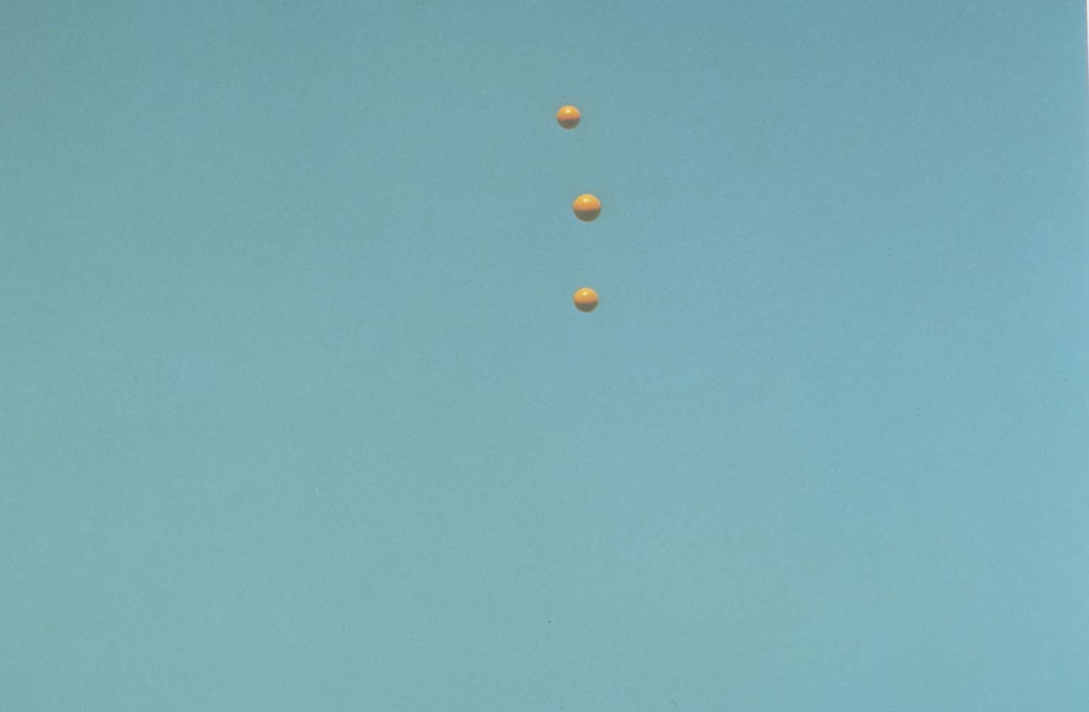 John Baldessari "Throwing Three Balls in the Air to get a Straight Line" , 1973