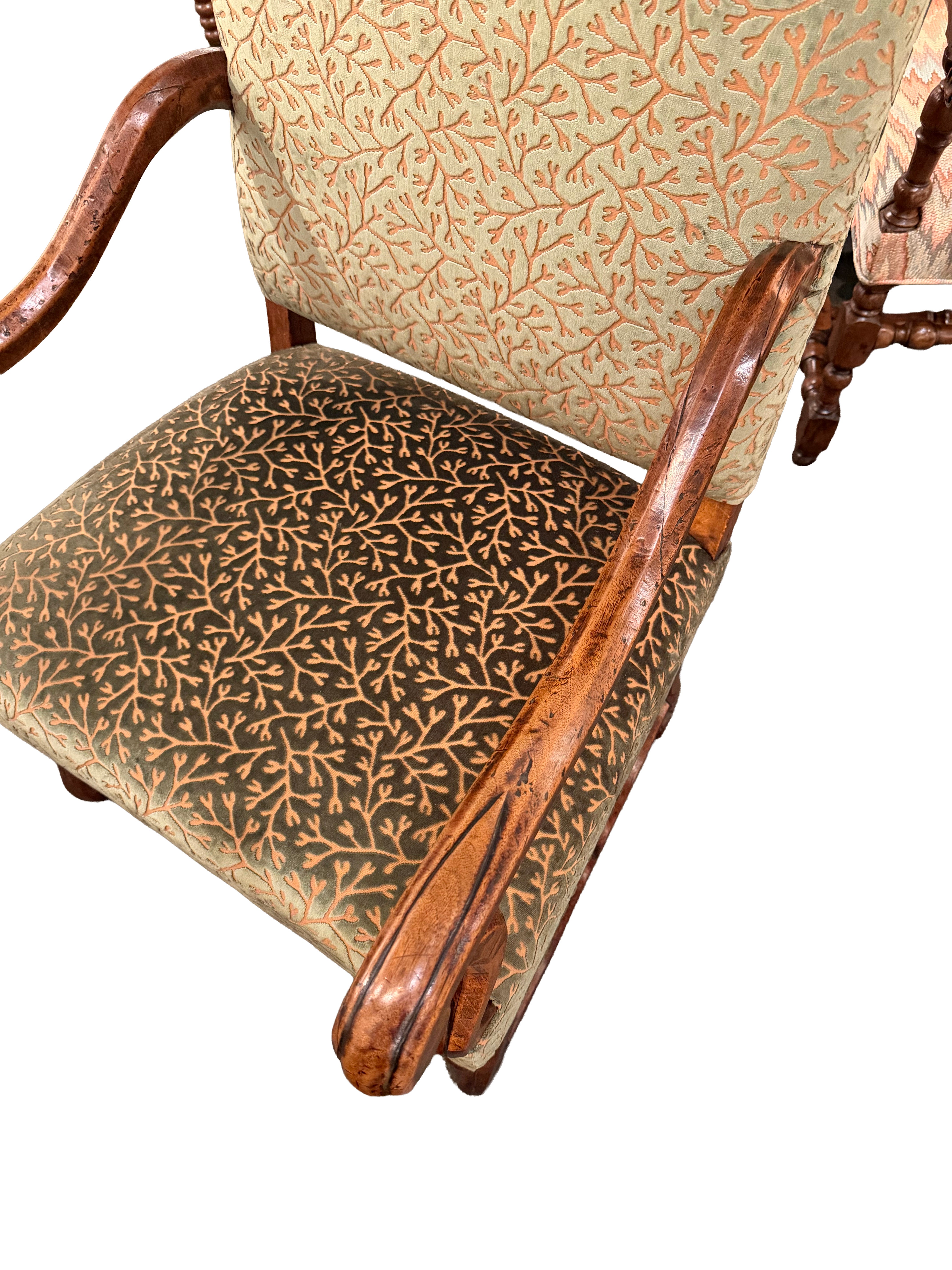 A Sculpted Walnut Louis XIII Bergere with Cut Velvet Upholstery