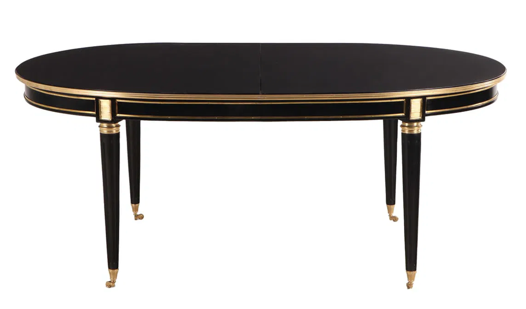 A Jansen Style Ebonized and Bronze Mounted Dining Table