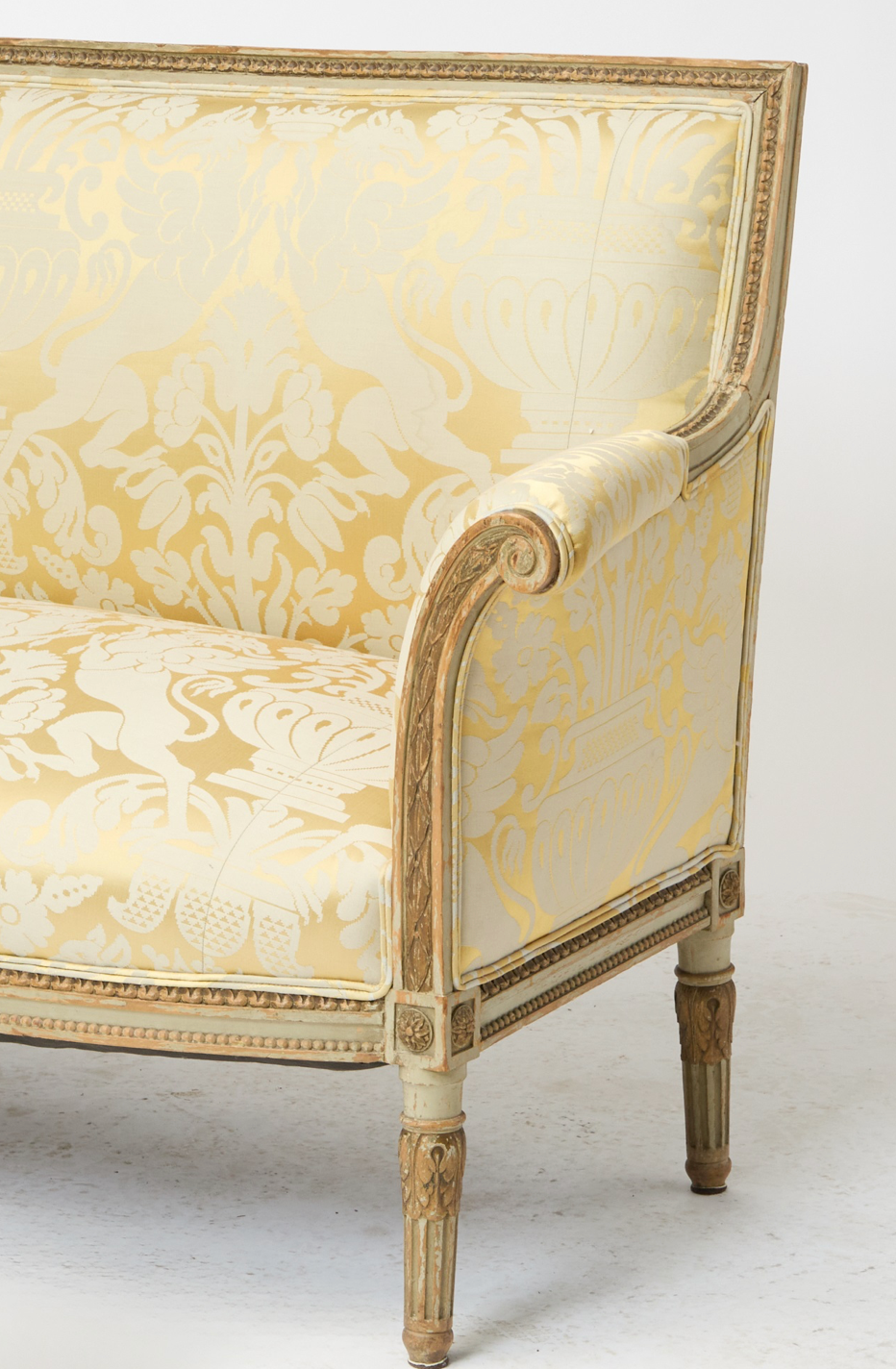 Louis XVI Upholstered Painted and Parcel Giltwood Settee