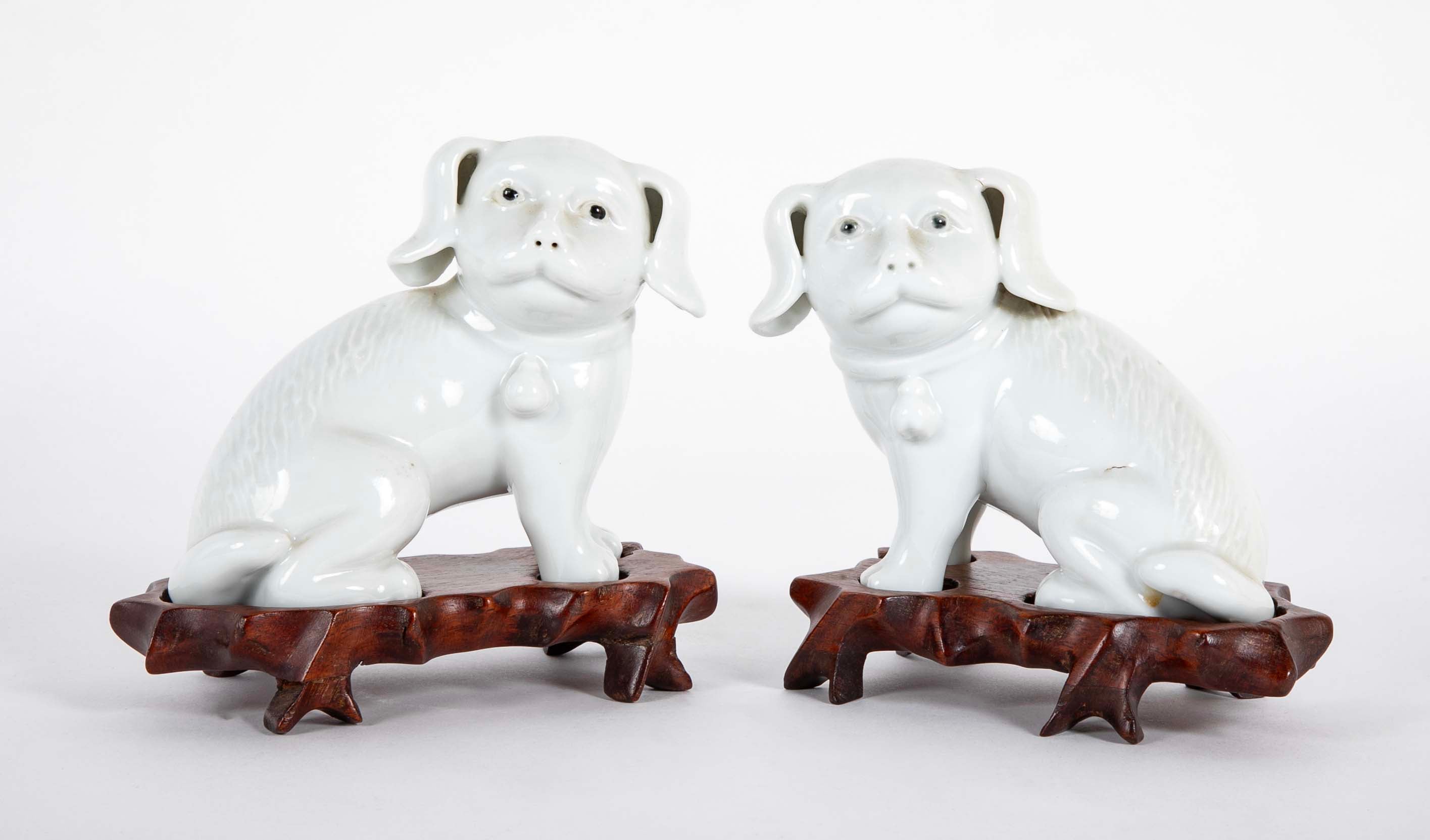 Pair of 19th Century Chinese Blanc de Chine Pekingese Porcelain Dogs