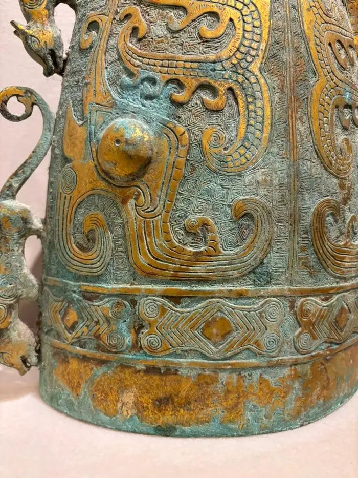 Archaistic Zhou Dynasty Style Gilt Bronze Bell with Verdigris Patina