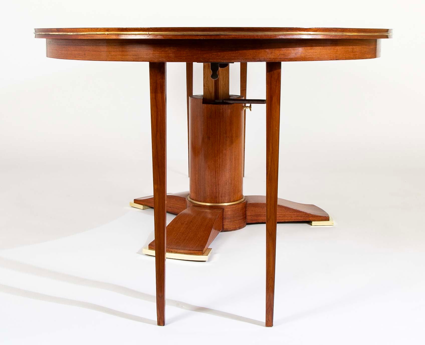 Round Table elevation system by Jules Leleu