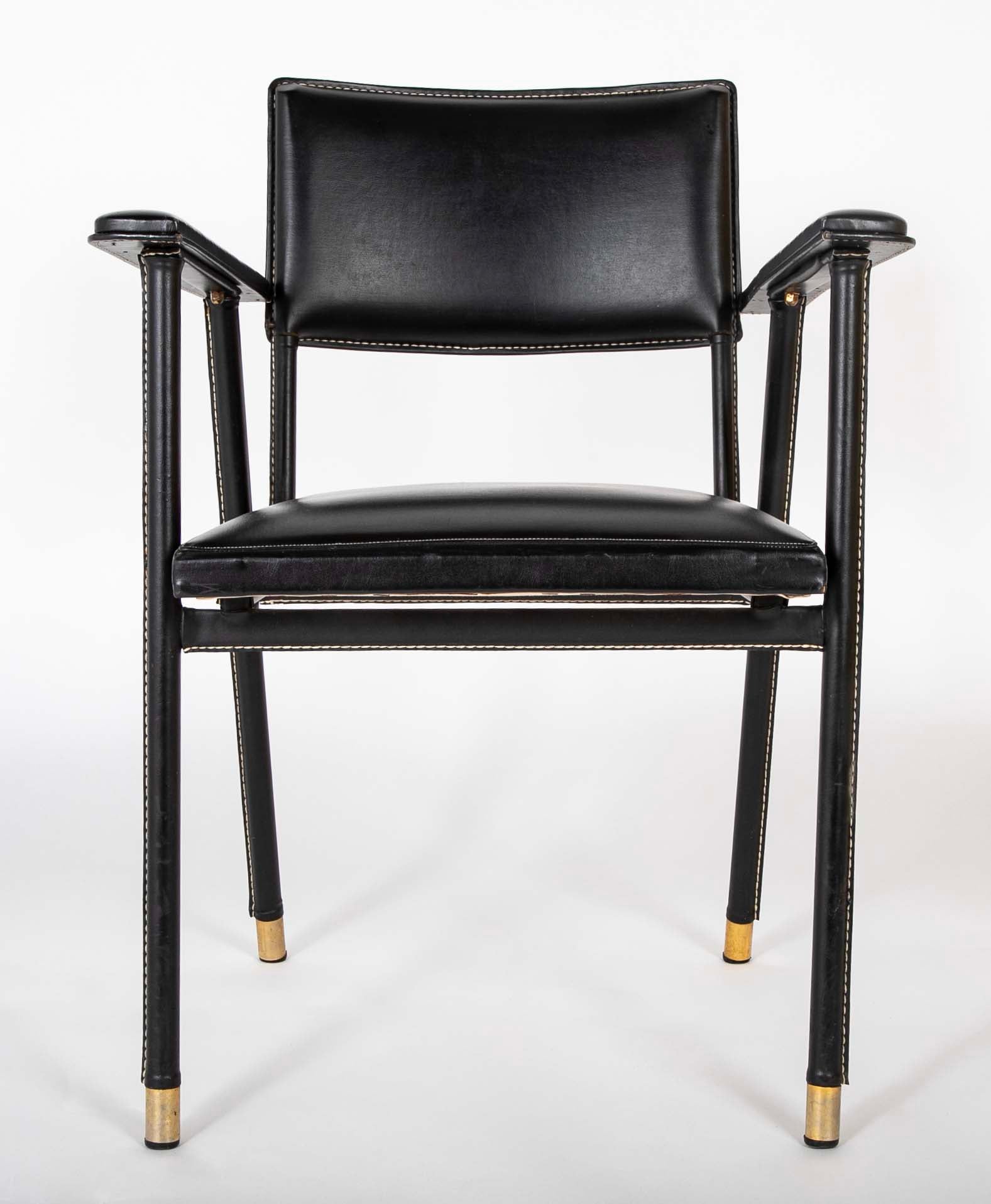 A Black Vinyl Wrapped Armchair Attributed to Jacques Adnet