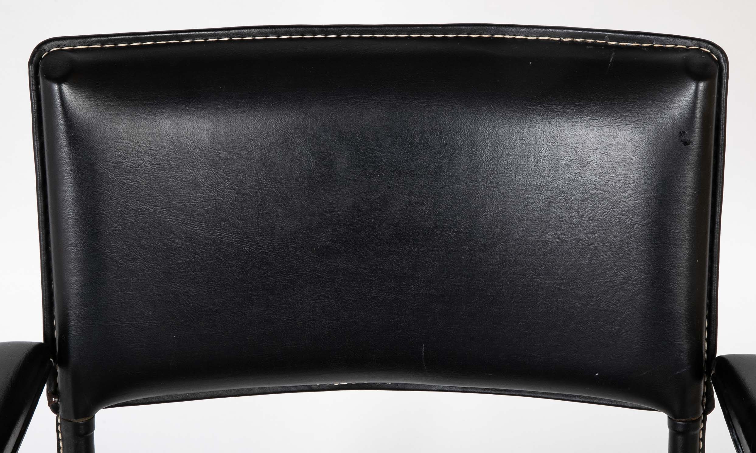 A Black Vinyl Wrapped Armchair Attributed to Jacques Adnet