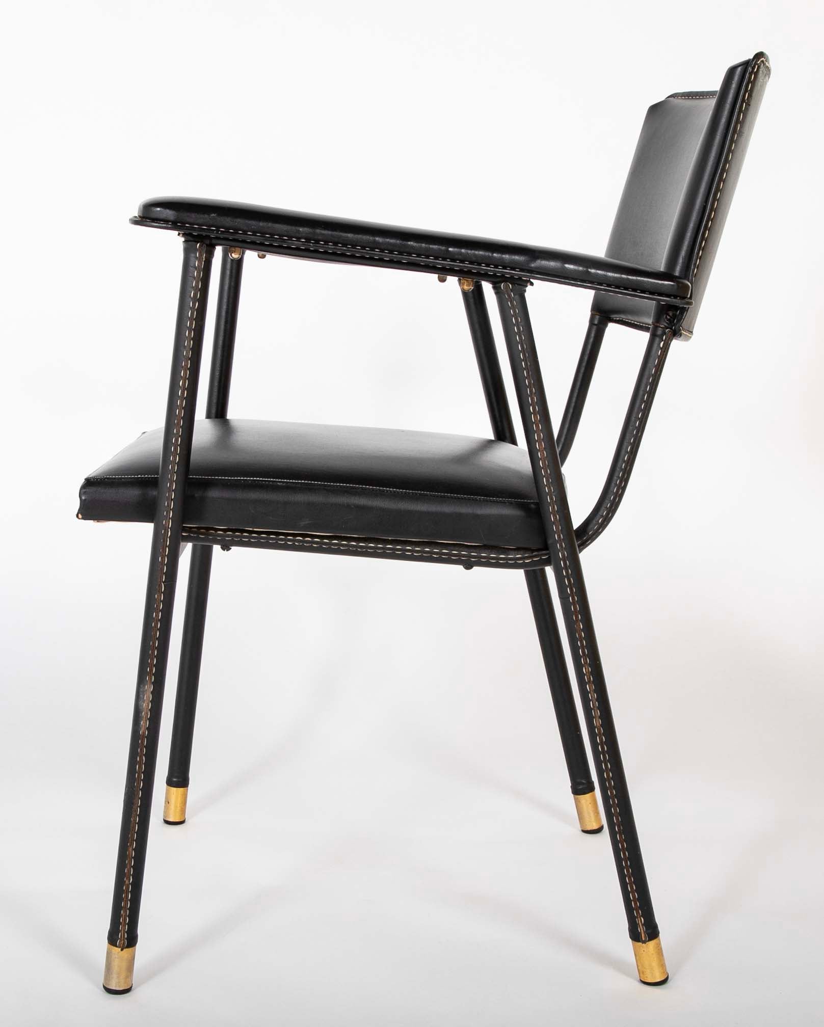 A Black Vinyl Wrapped Armchair Attributed to Jacques Adnet