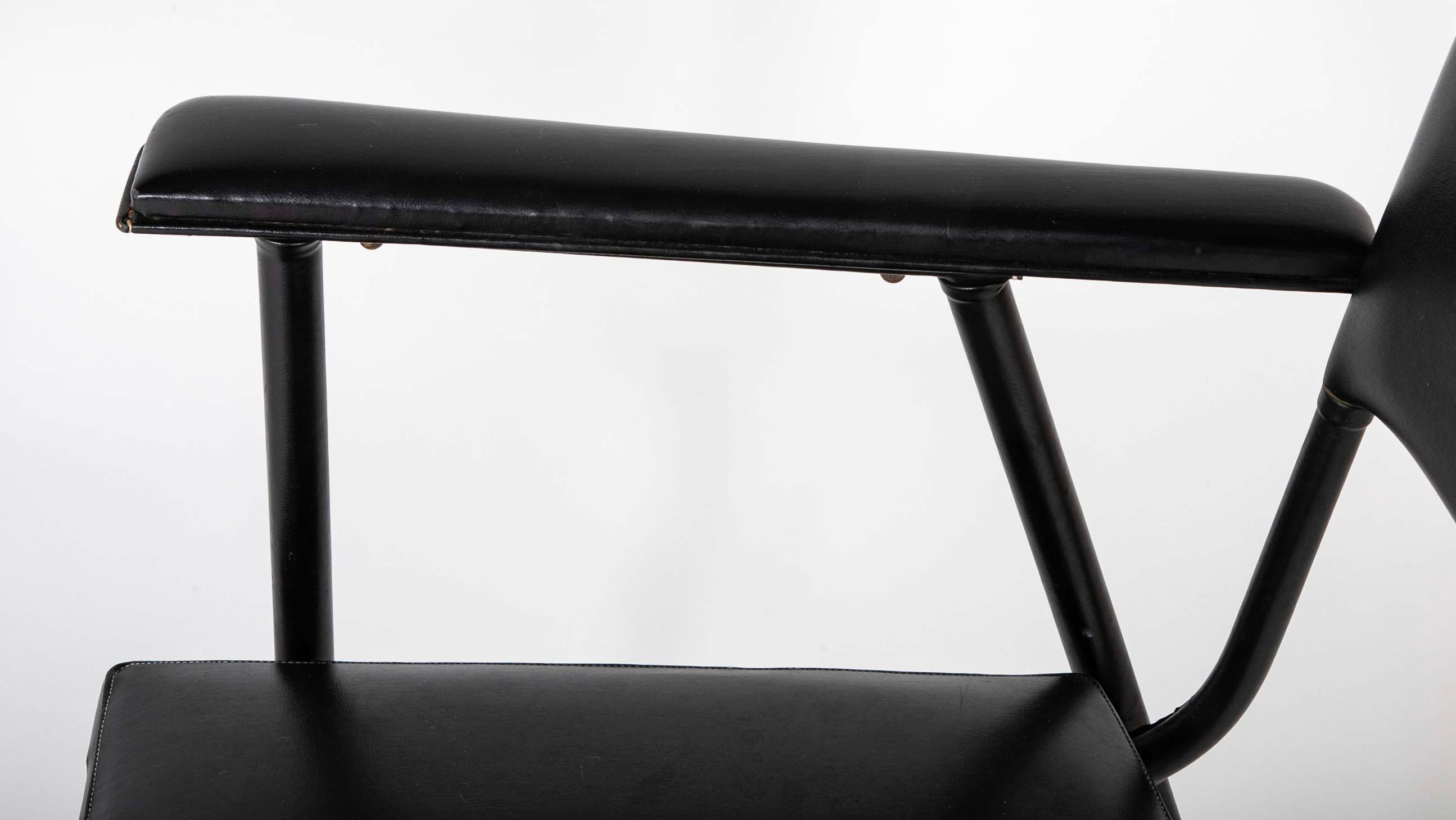 A Black Vinyl Wrapped Armchair Attributed to Jacques Adnet