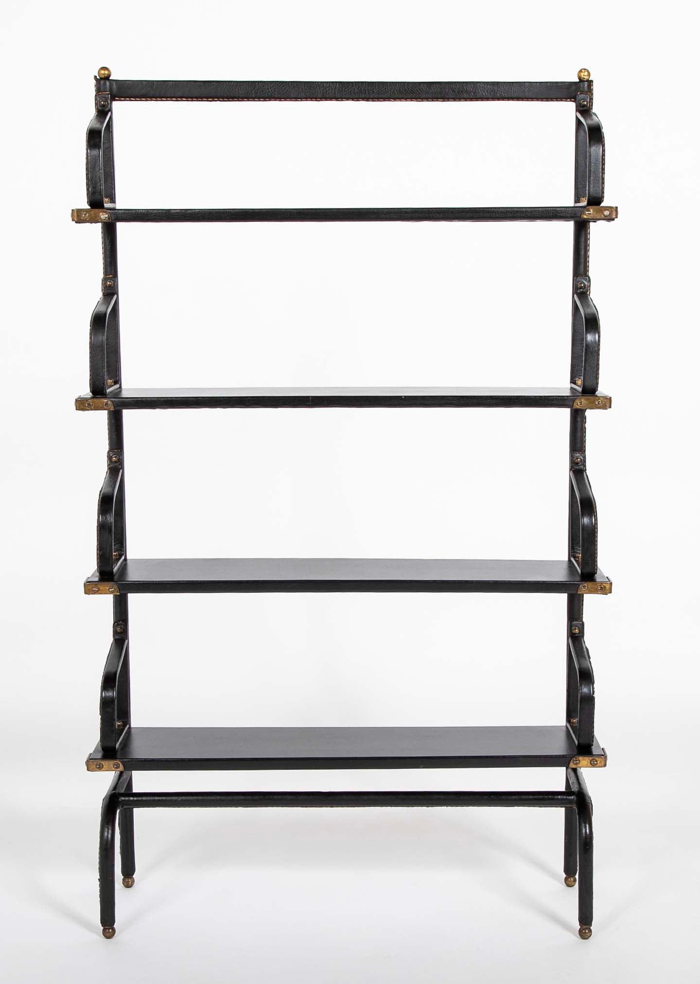 A Jacques Adnet Stitched Black Leather Covered Small Bookcase