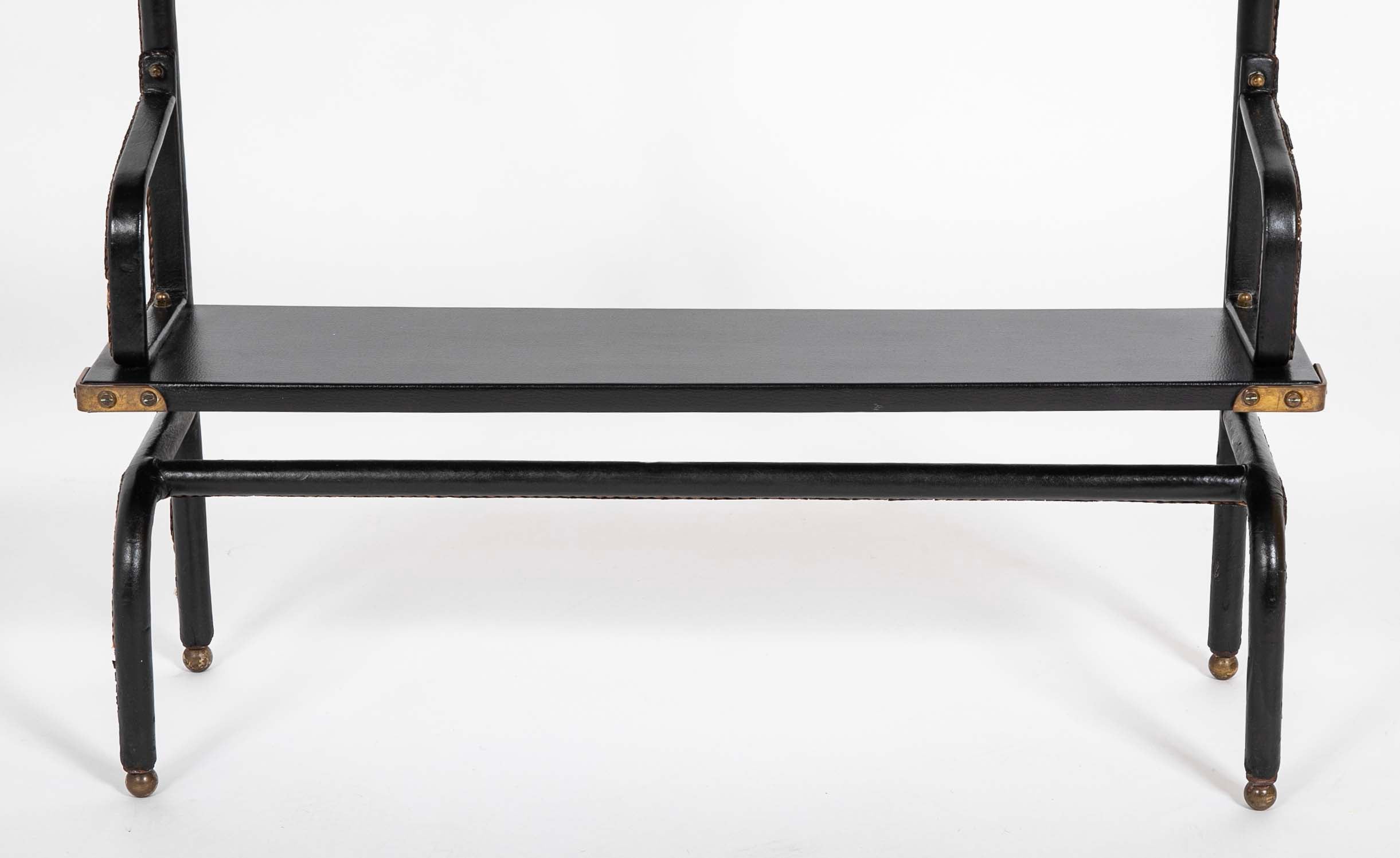 A Jacques Adnet Stitched Black Leather Covered Small Bookcase