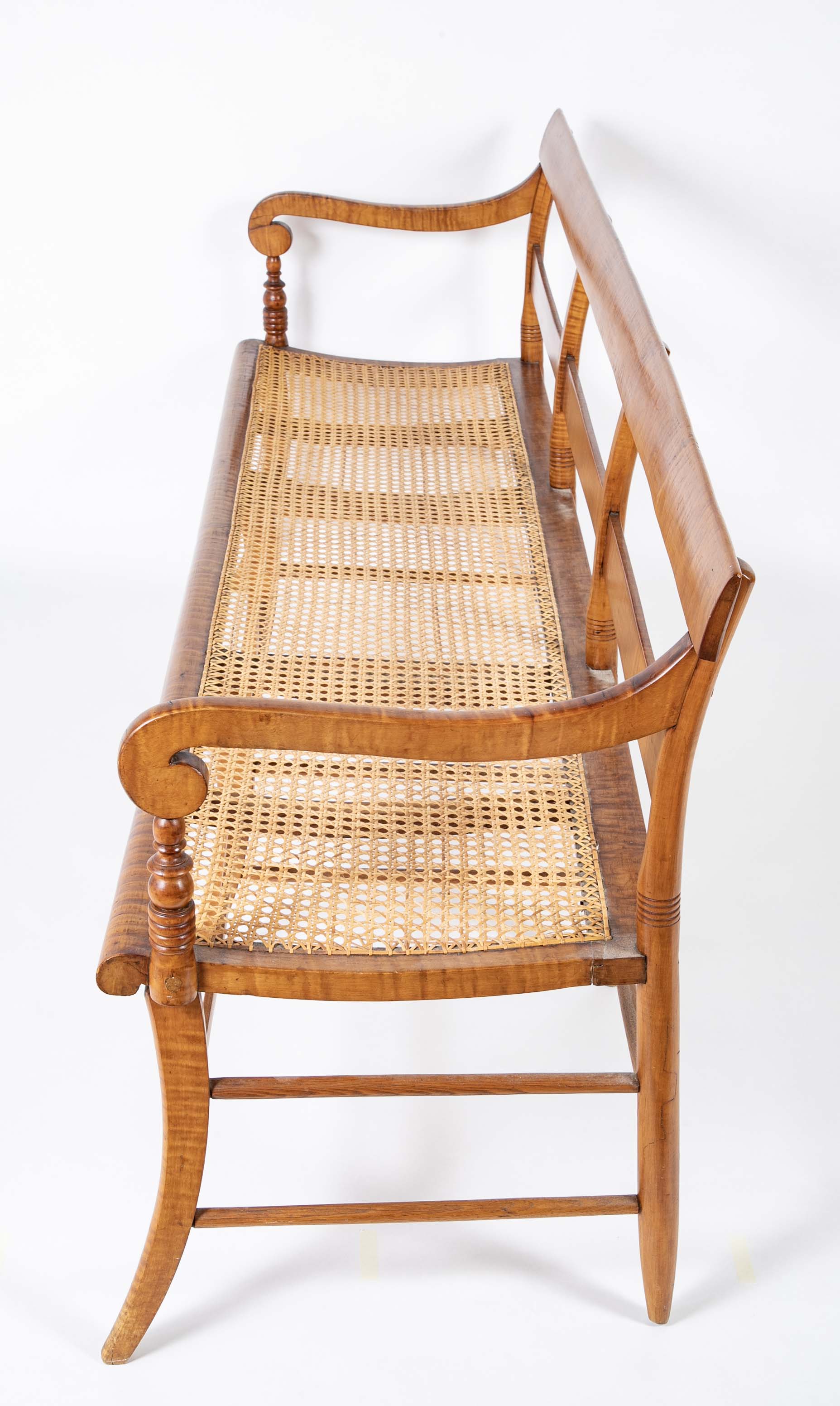 An American Tiger Maple Sheraton Settee with Cane Seat