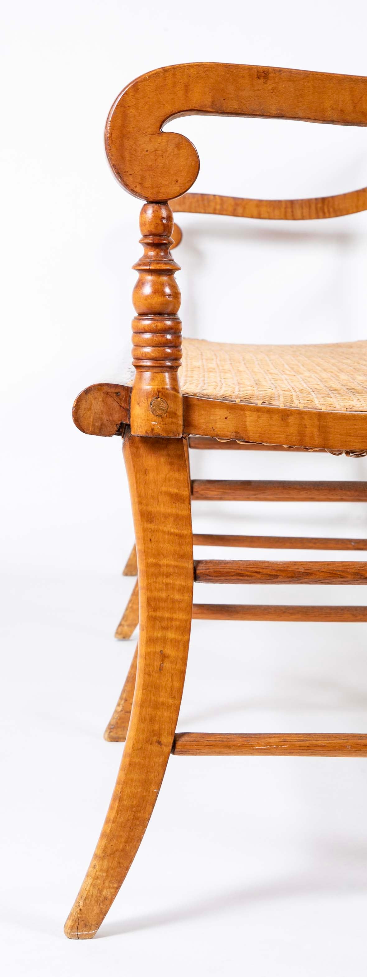 An American Tiger Maple Sheraton Settee with Cane Seat