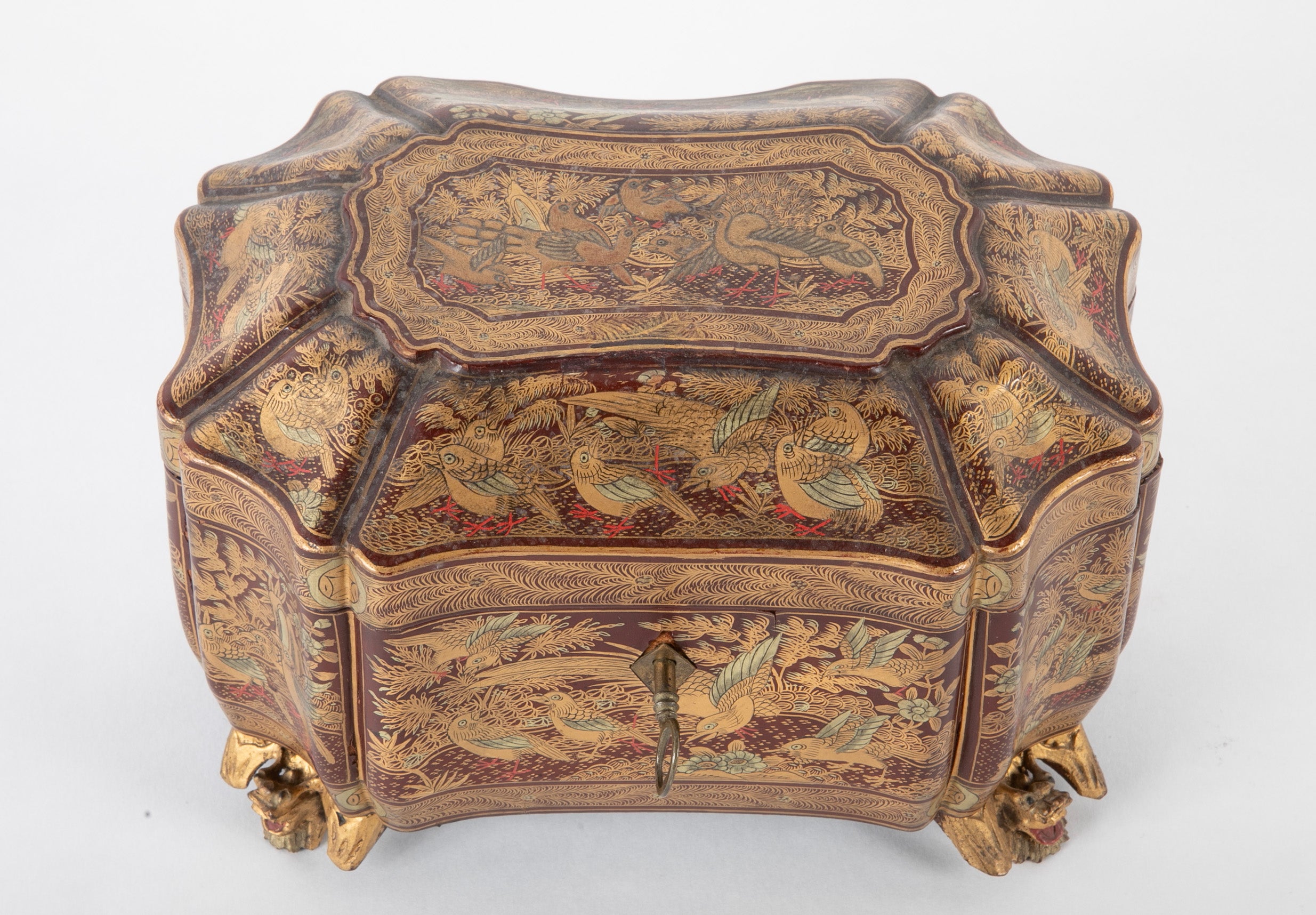 A Chinese Export Lacquered Tea Caddy with Pewter Fitted Interior