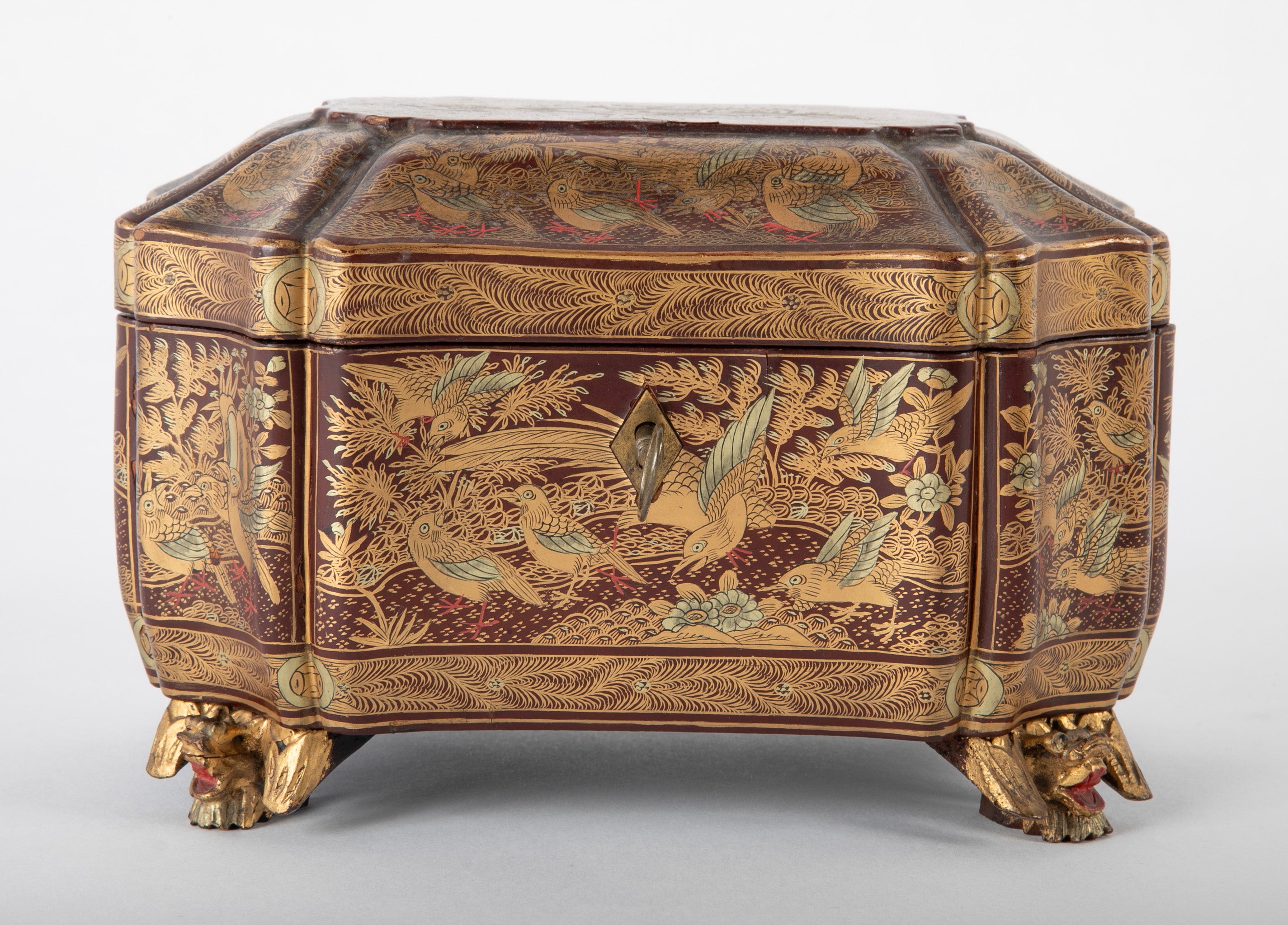 A Chinese Export Lacquered Tea Caddy with Pewter Fitted Interior