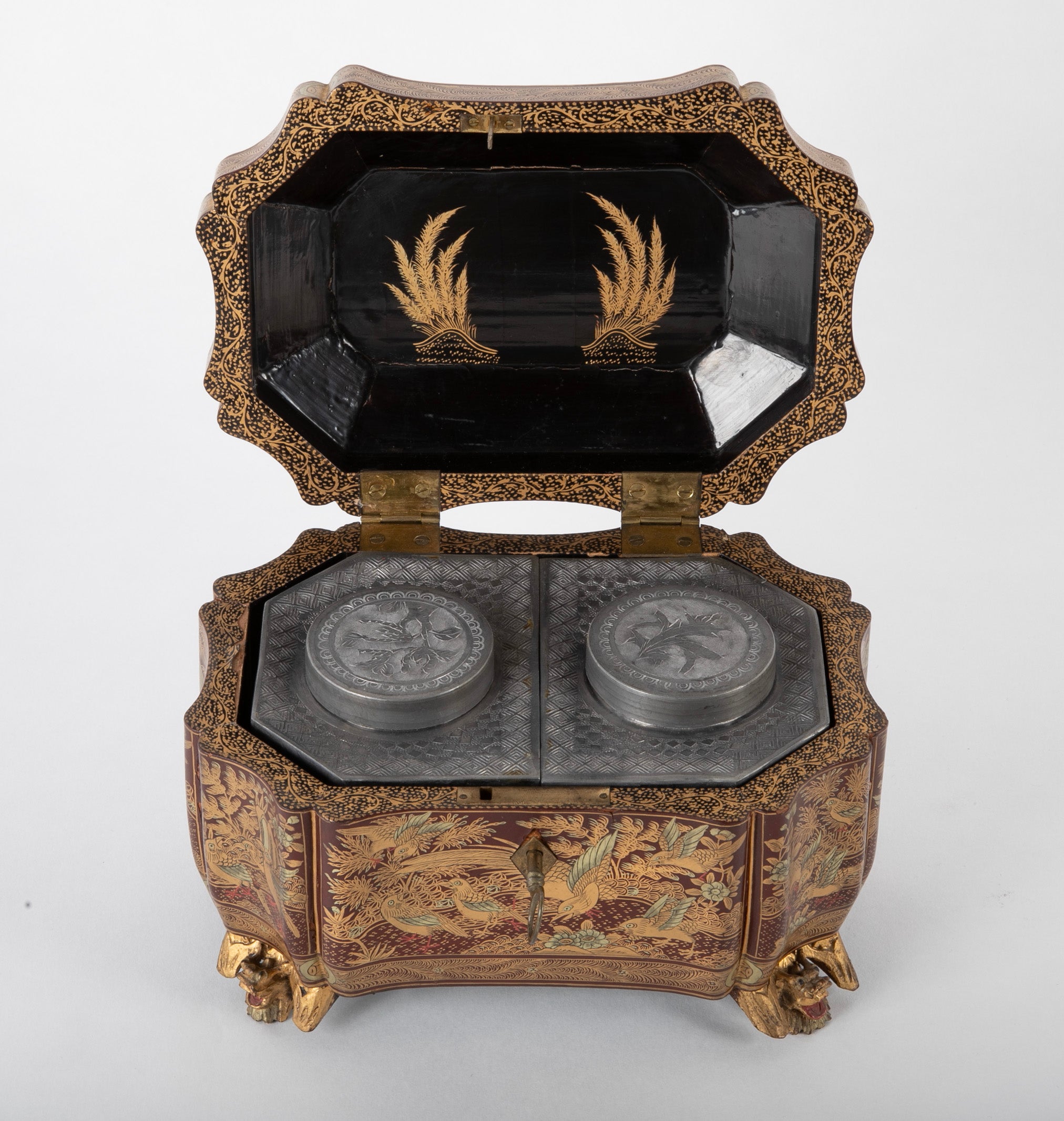 A Chinese Export Lacquered Tea Caddy with Pewter Fitted Interior