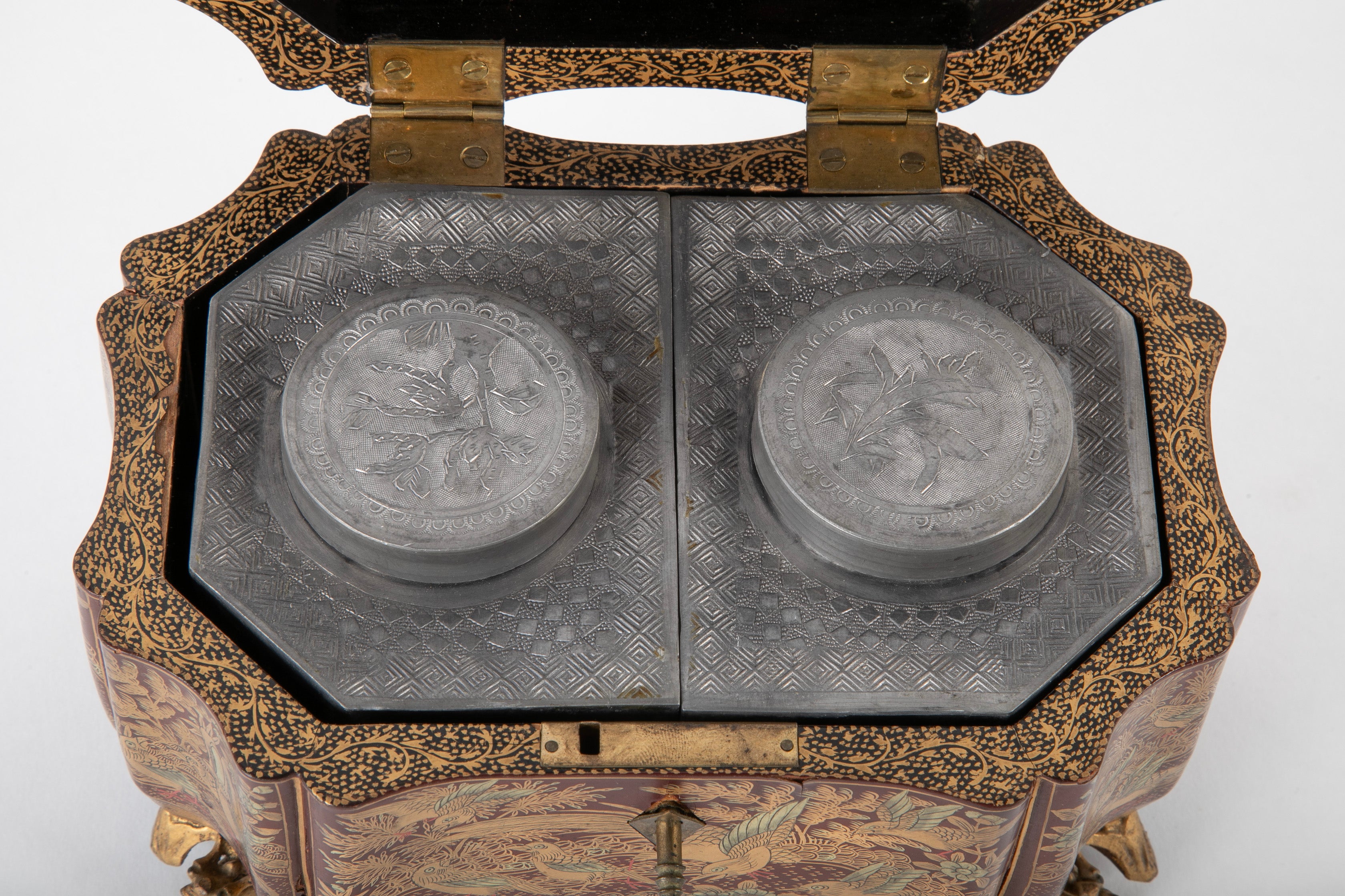 A Chinese Export Lacquered Tea Caddy with Pewter Fitted Interior