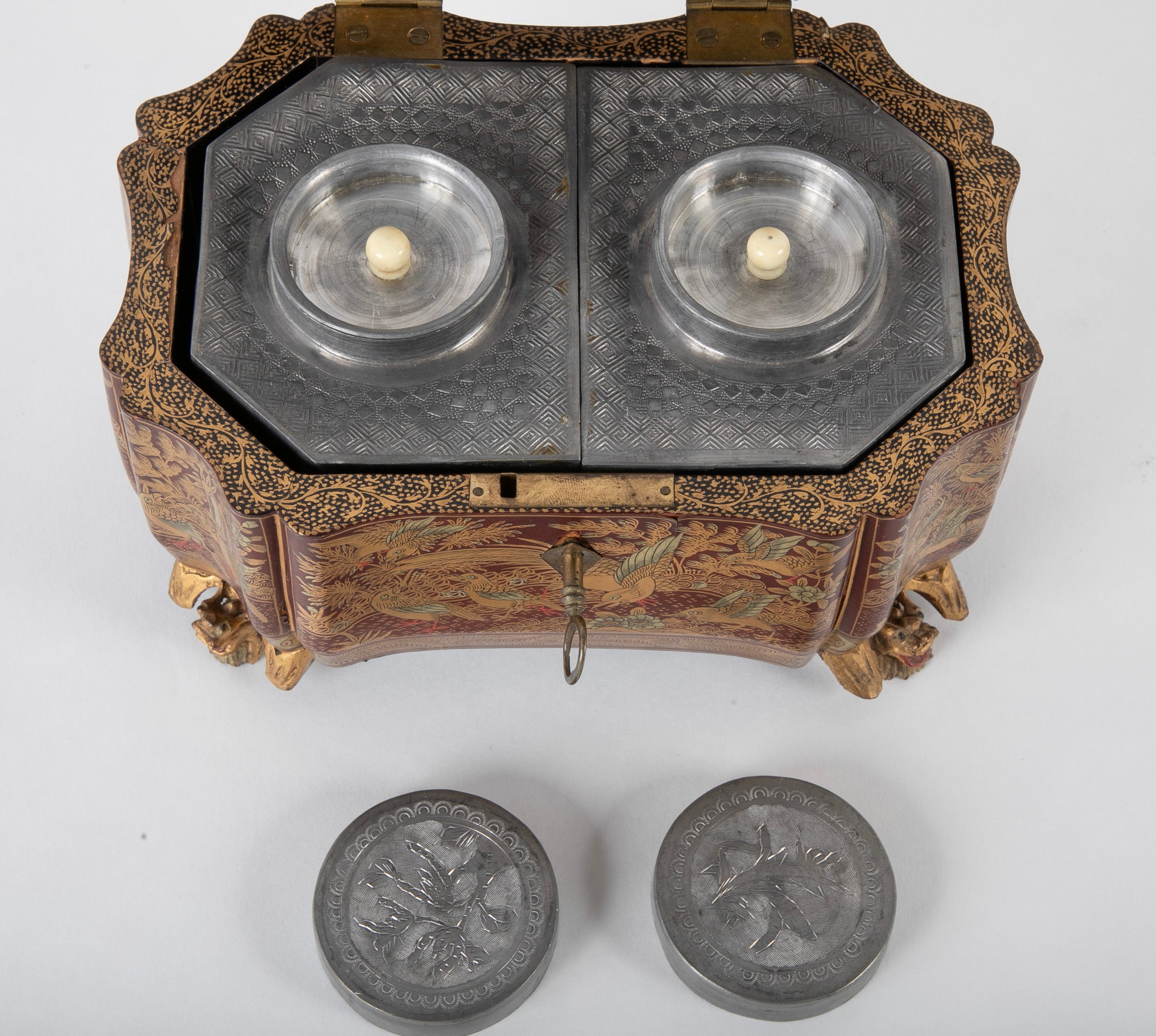 A Chinese Export Lacquered Tea Caddy with Pewter Fitted Interior