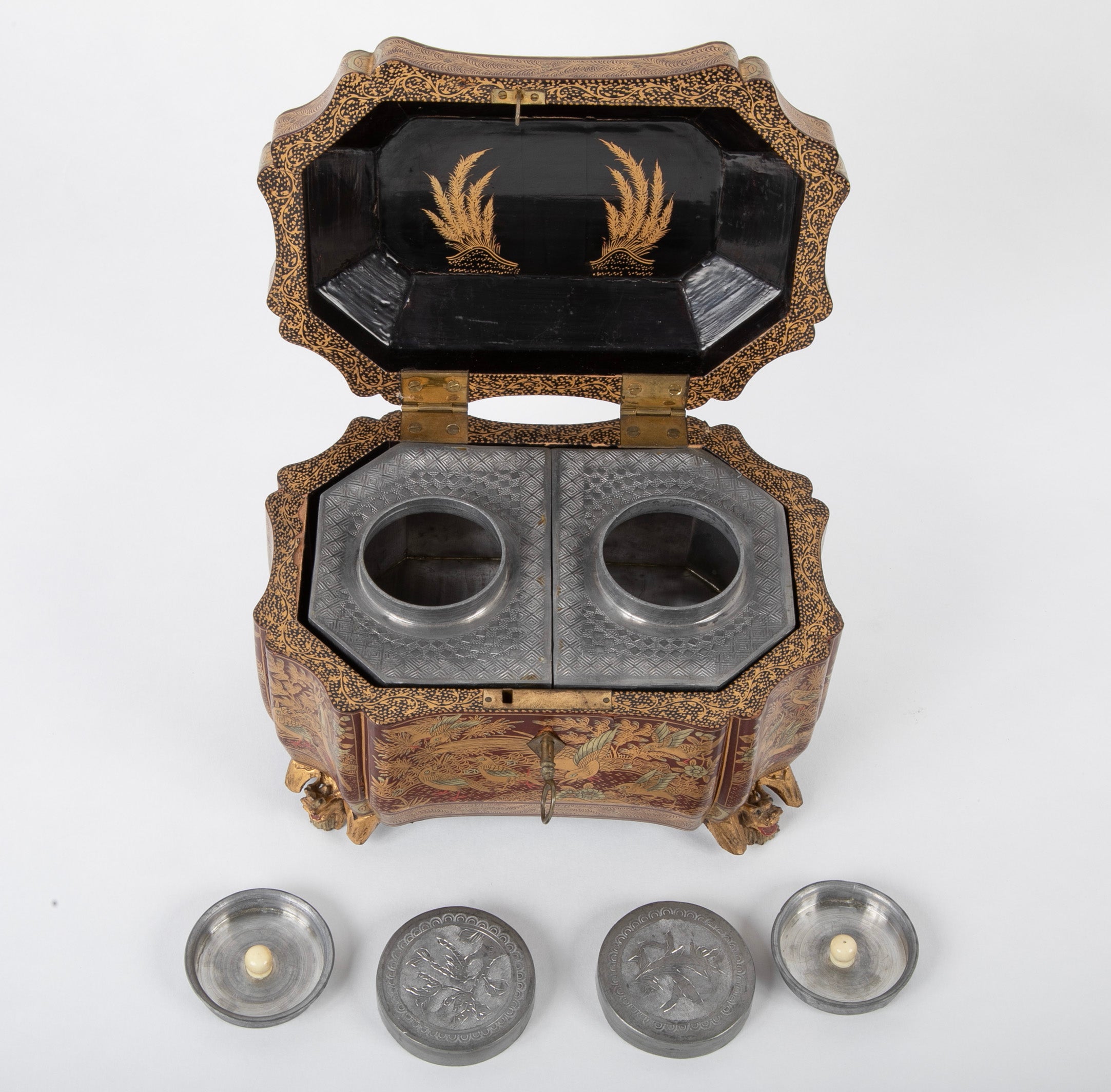 A Chinese Export Lacquered Tea Caddy with Pewter Fitted Interior