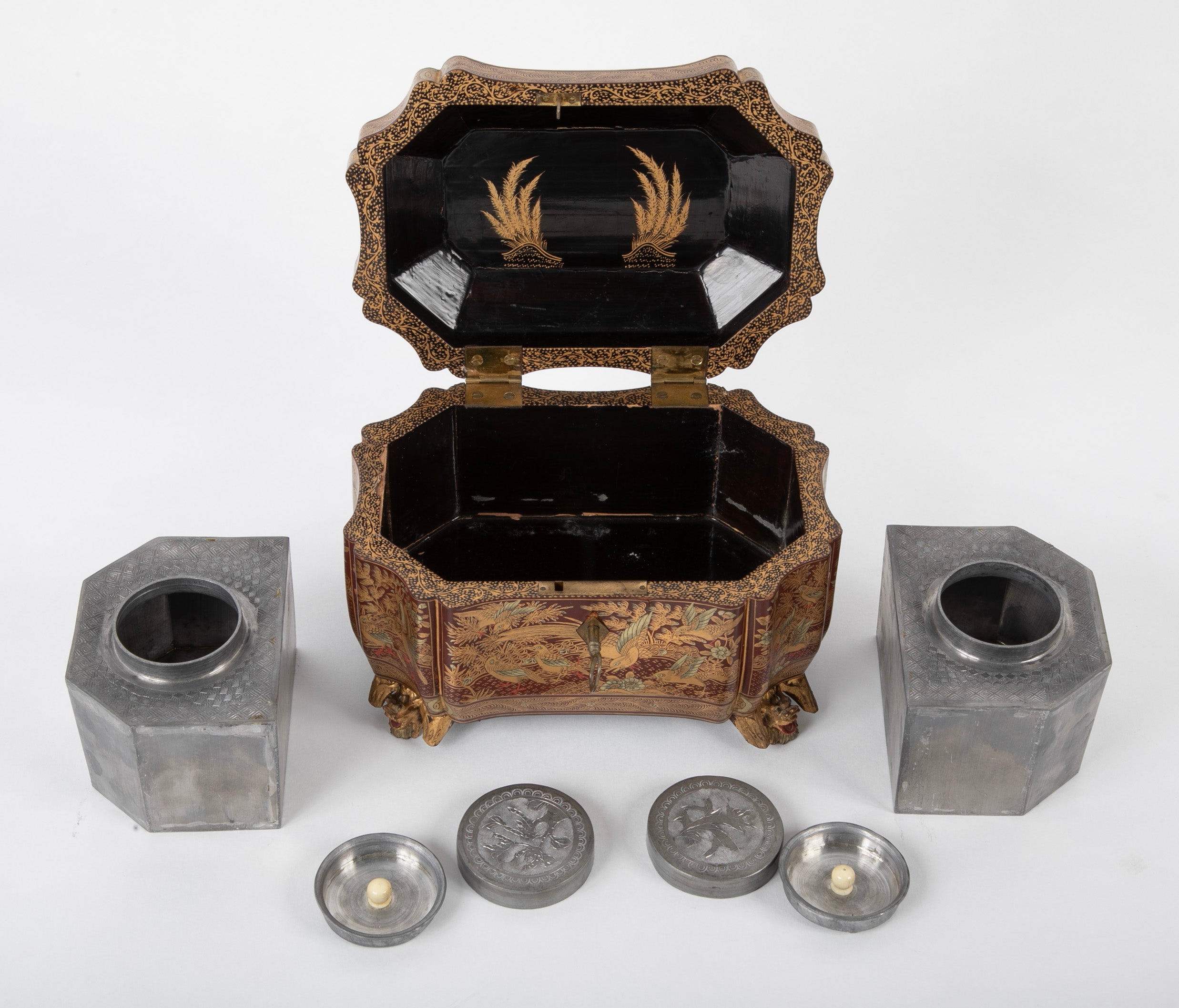 A Chinese Export Lacquered Tea Caddy with Pewter Fitted Interior