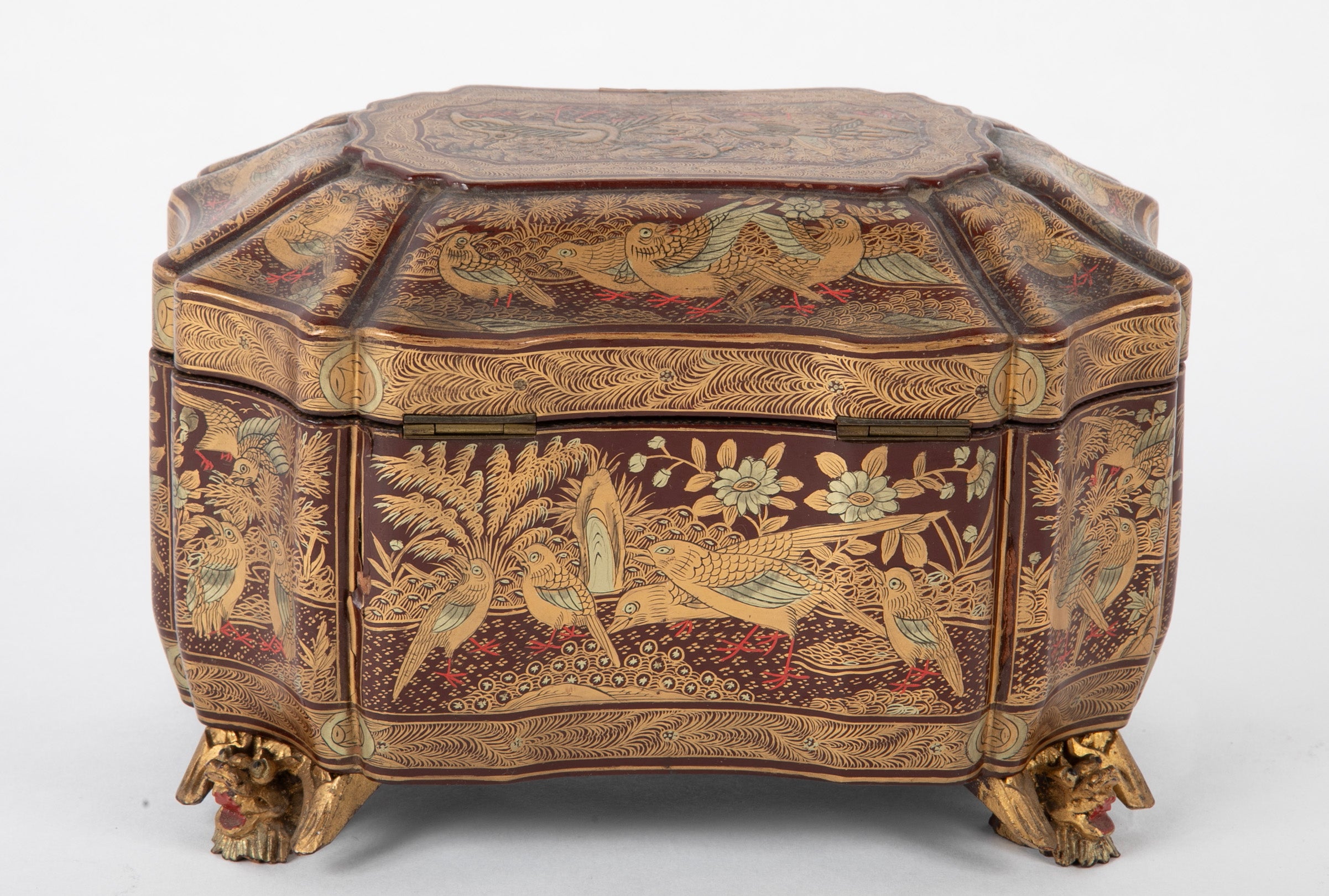 A Chinese Export Lacquered Tea Caddy with Pewter Fitted Interior