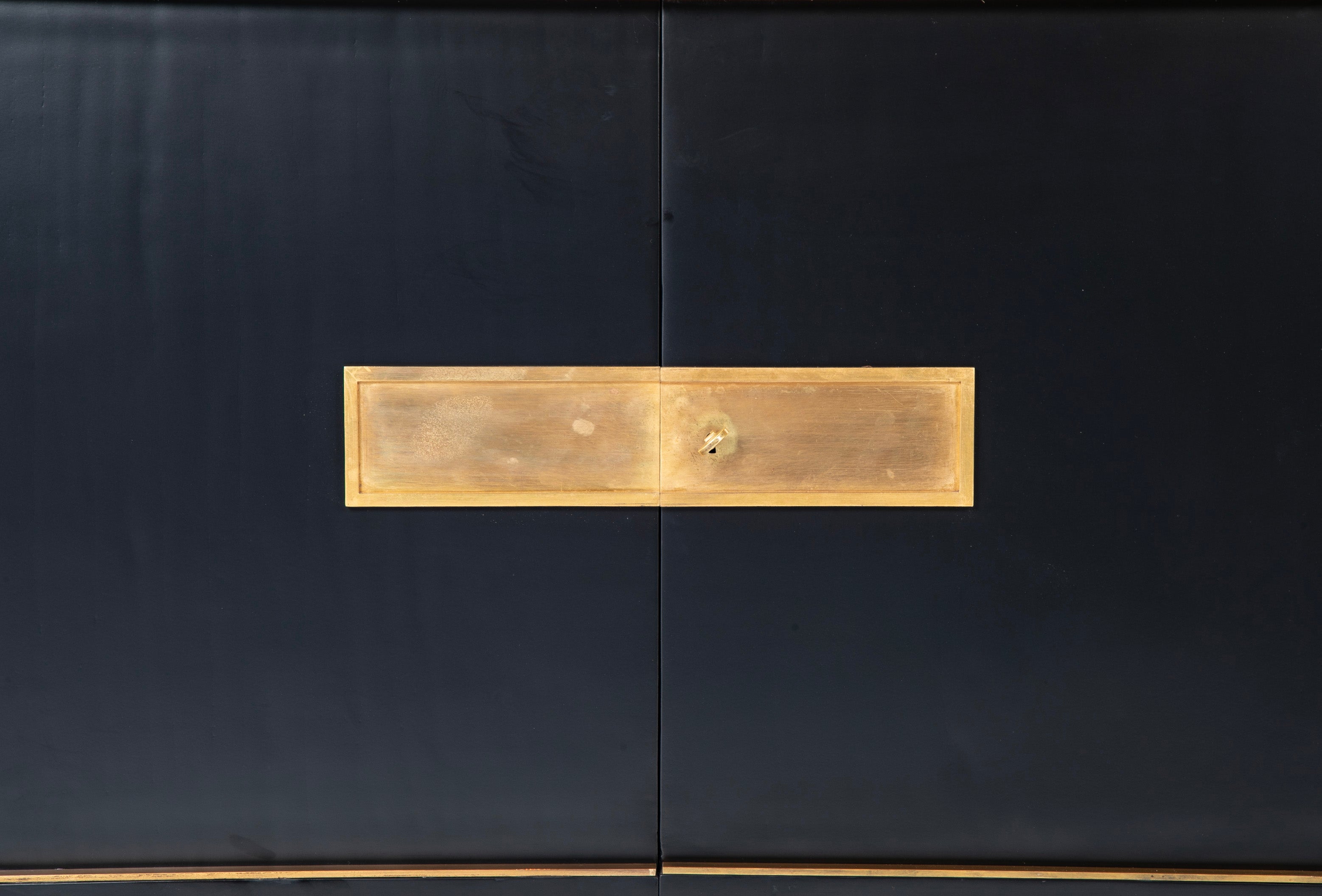 A Striking Mid-Century Two Door Cabinet by Jacques Adnet