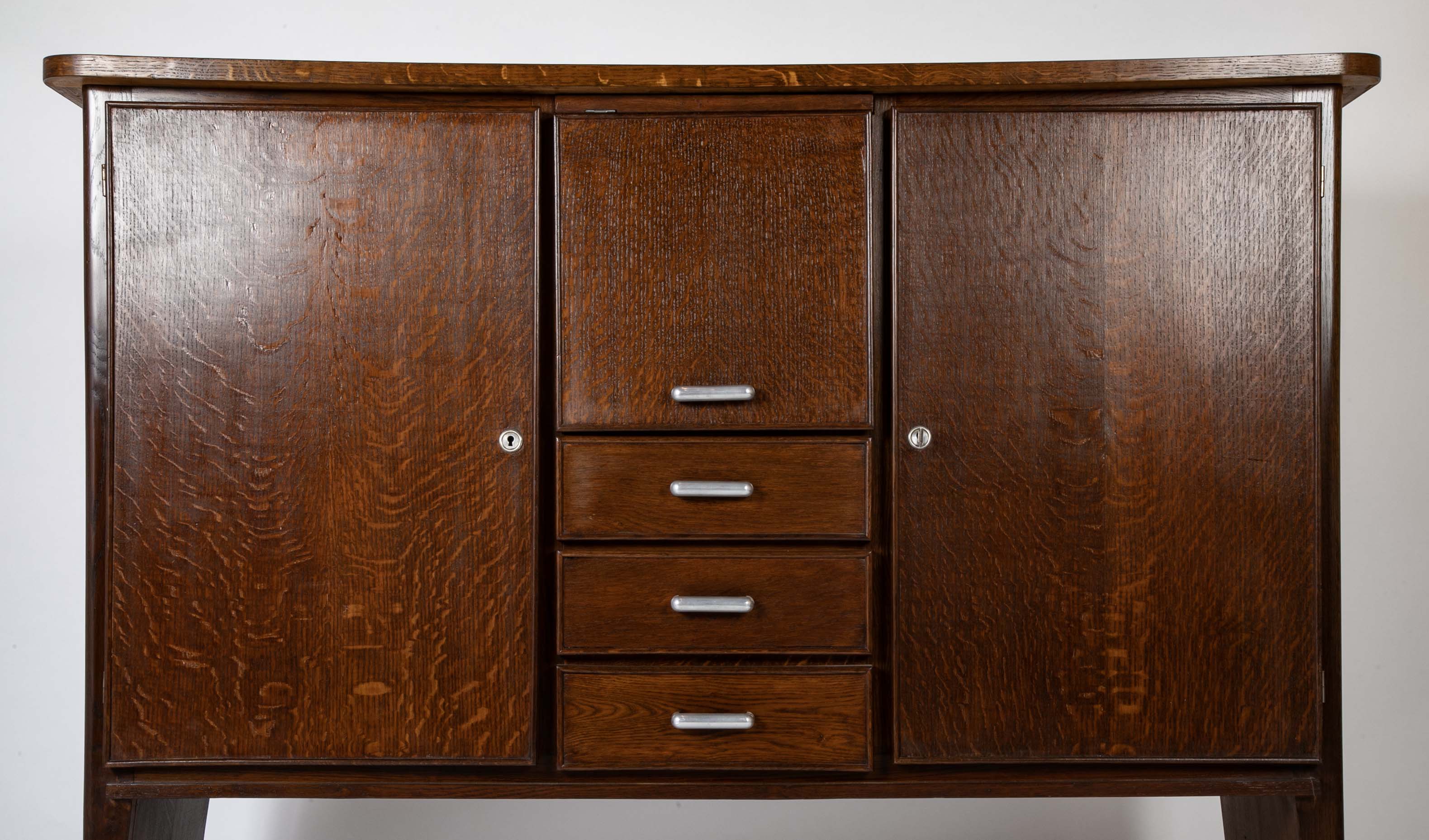 An Oak and Aluminum Cabinet by Rene Gabriel