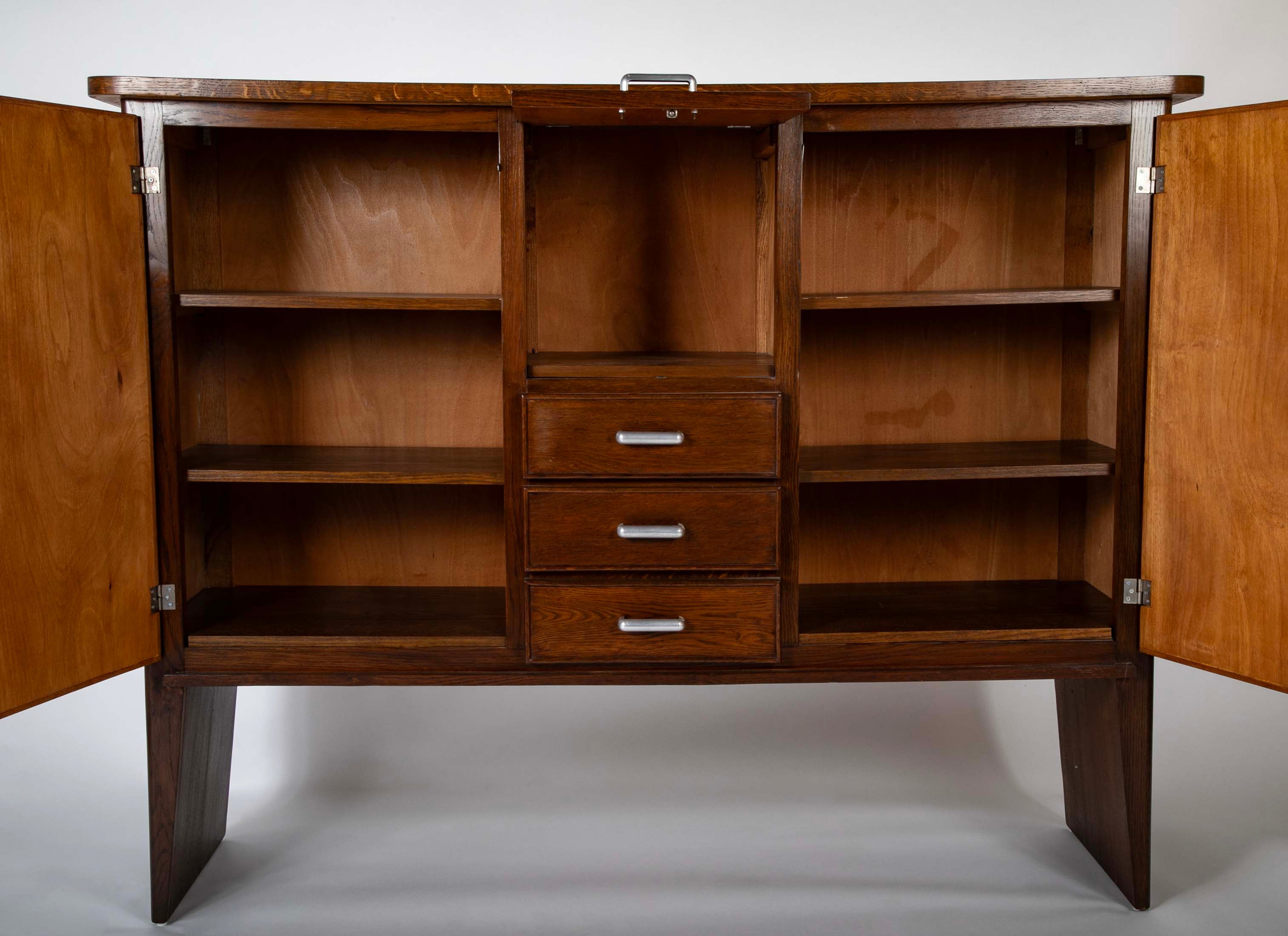 An Oak and Aluminum Cabinet by Rene Gabriel