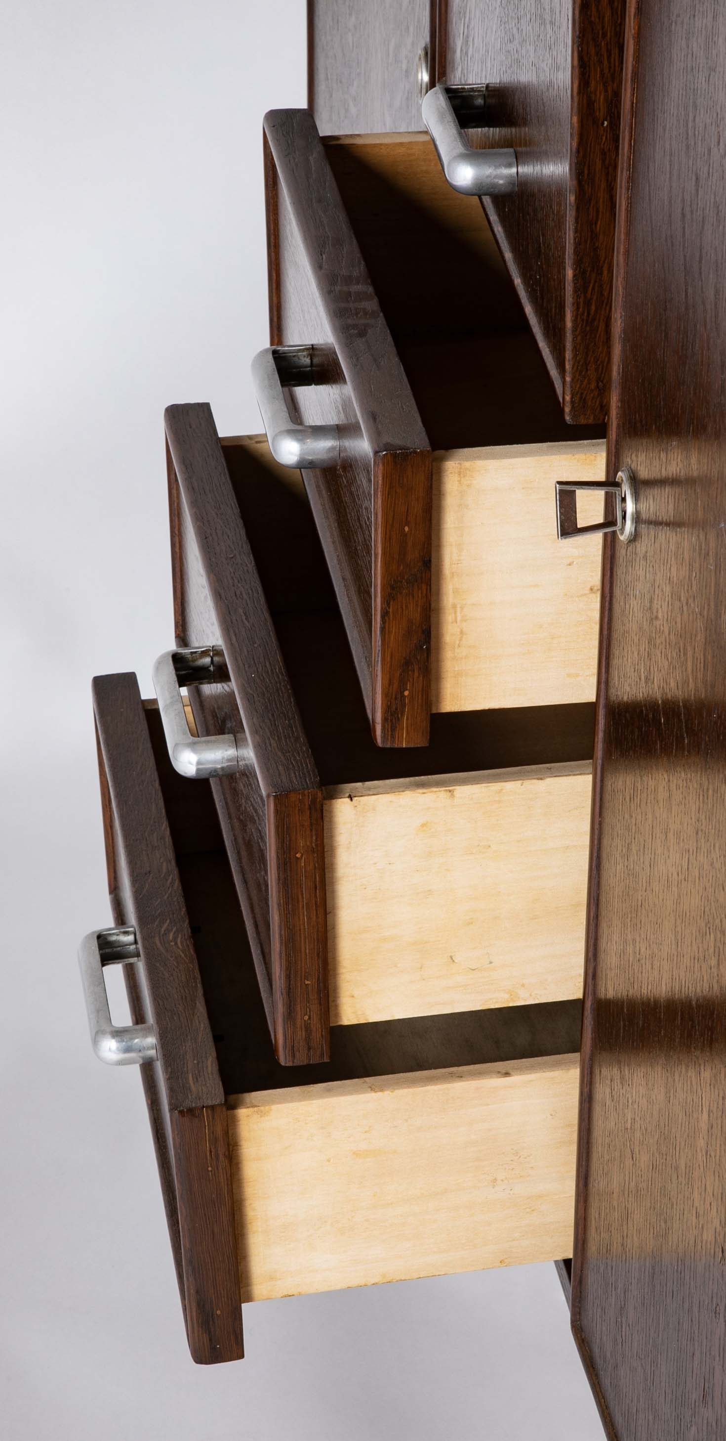 An Oak and Aluminum Cabinet by Rene Gabriel