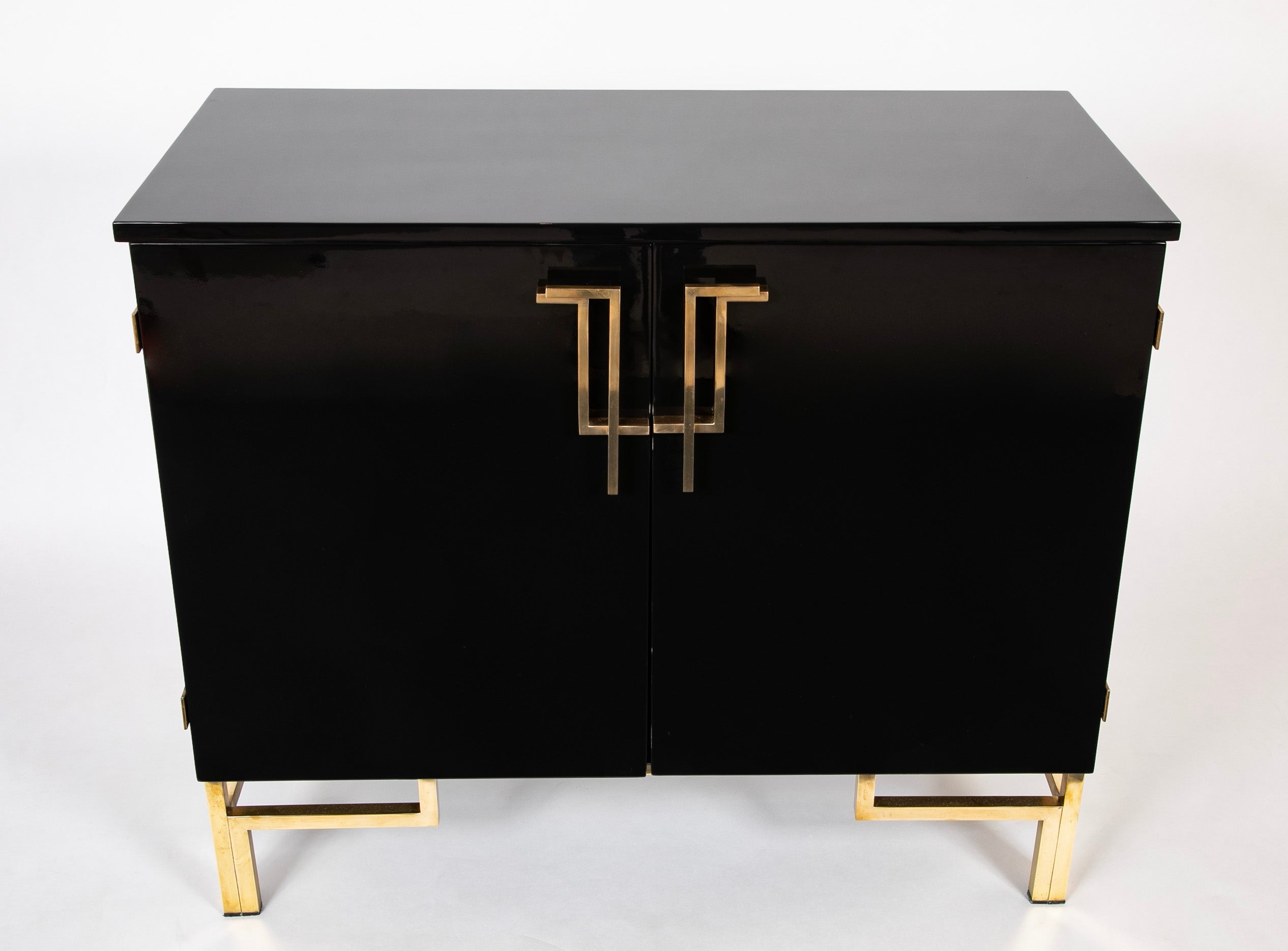 A Maison Jansen Black Lacquer Cabinet with Gilded Brass Accents