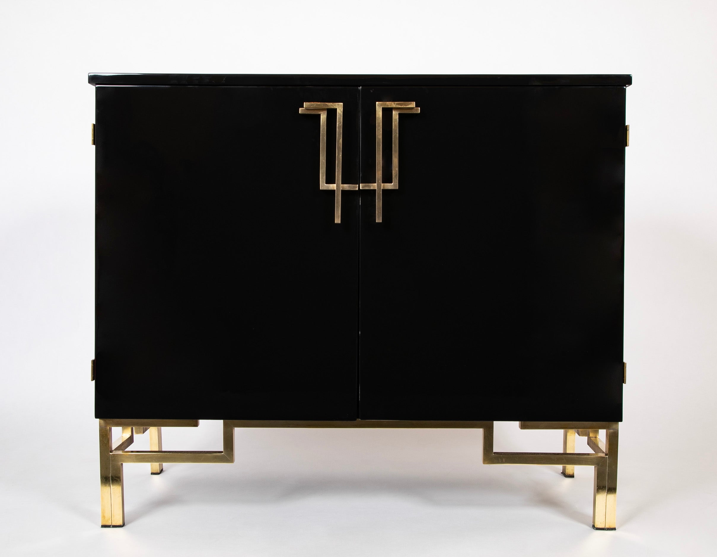 A Maison Jansen Black Lacquer Cabinet with Gilded Brass Accents