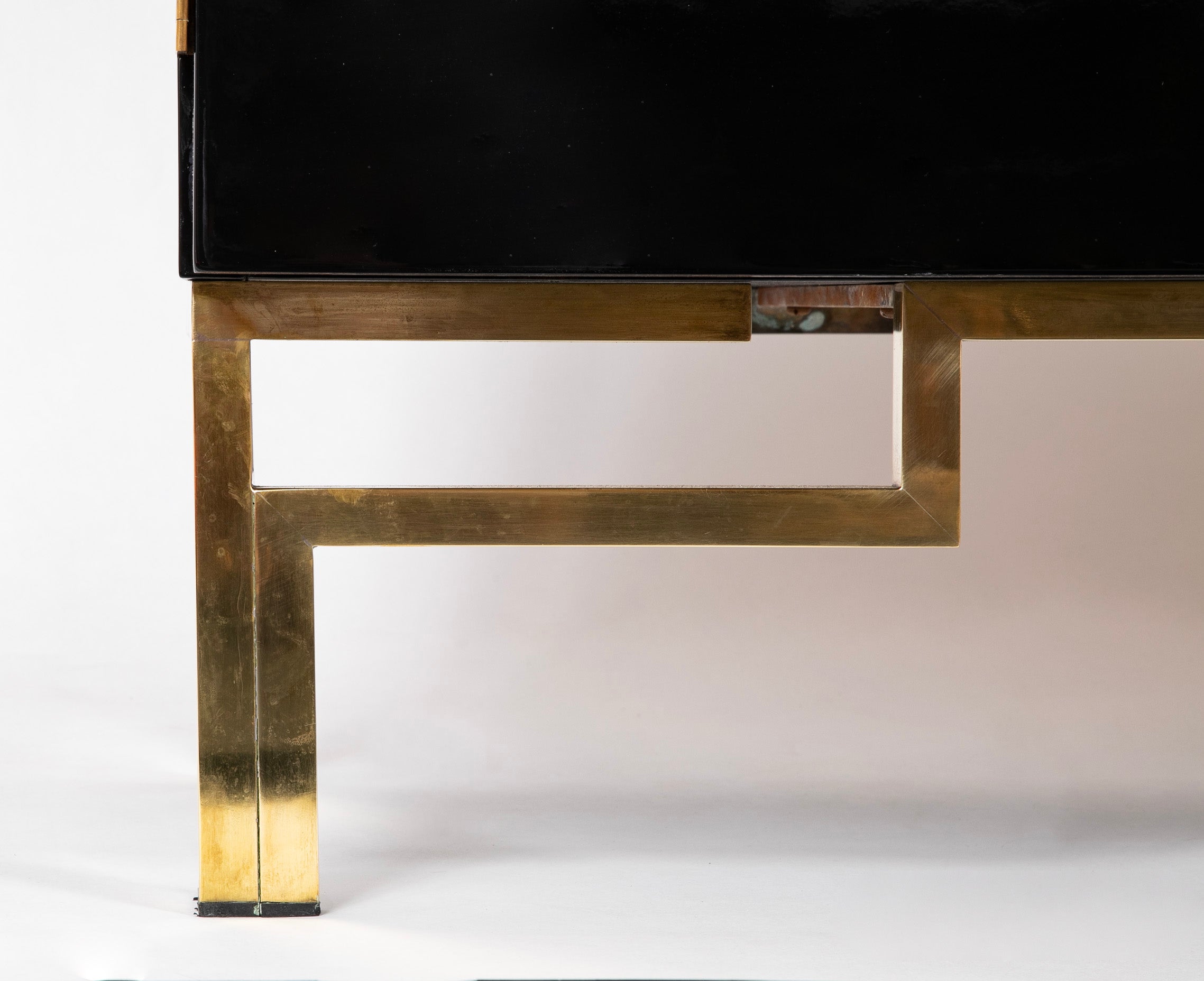 A Maison Jansen Black Lacquer Cabinet with Gilded Brass Accents