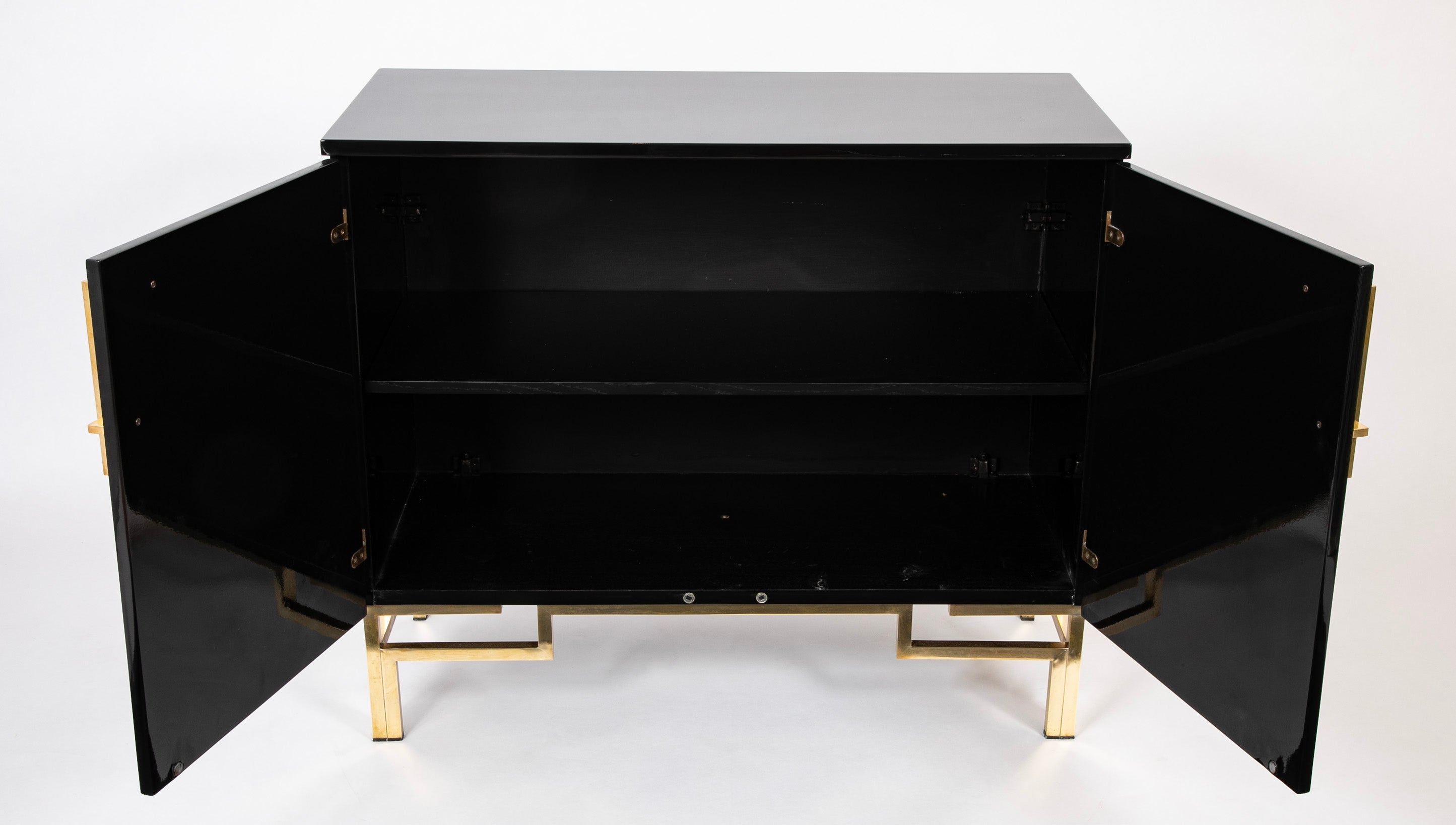 A Maison Jansen Black Lacquer Cabinet with Gilded Brass Accents