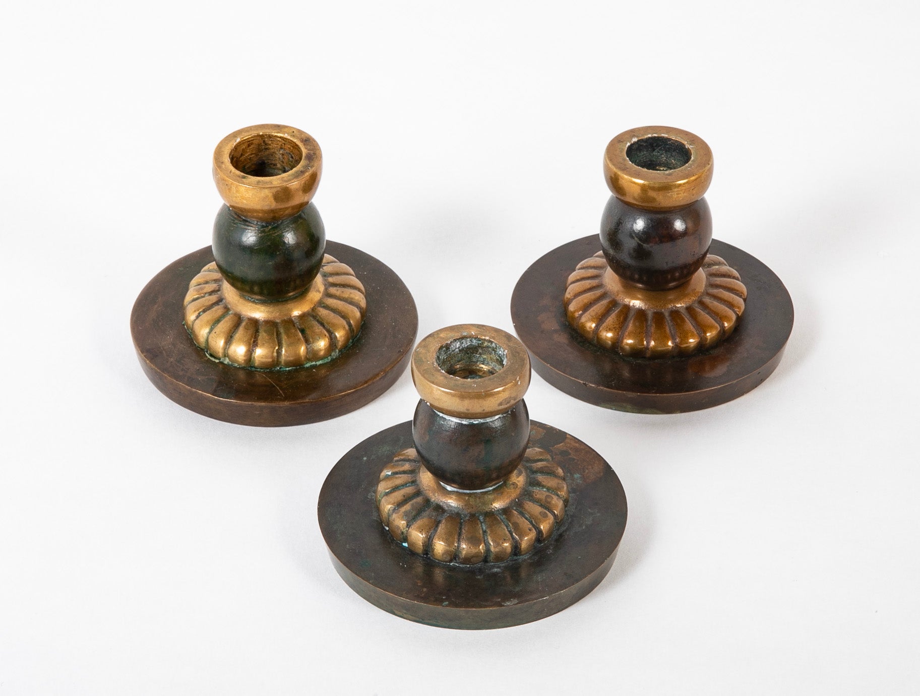 Set of Three Danish Patinated & Polished Bronze Candlesticks