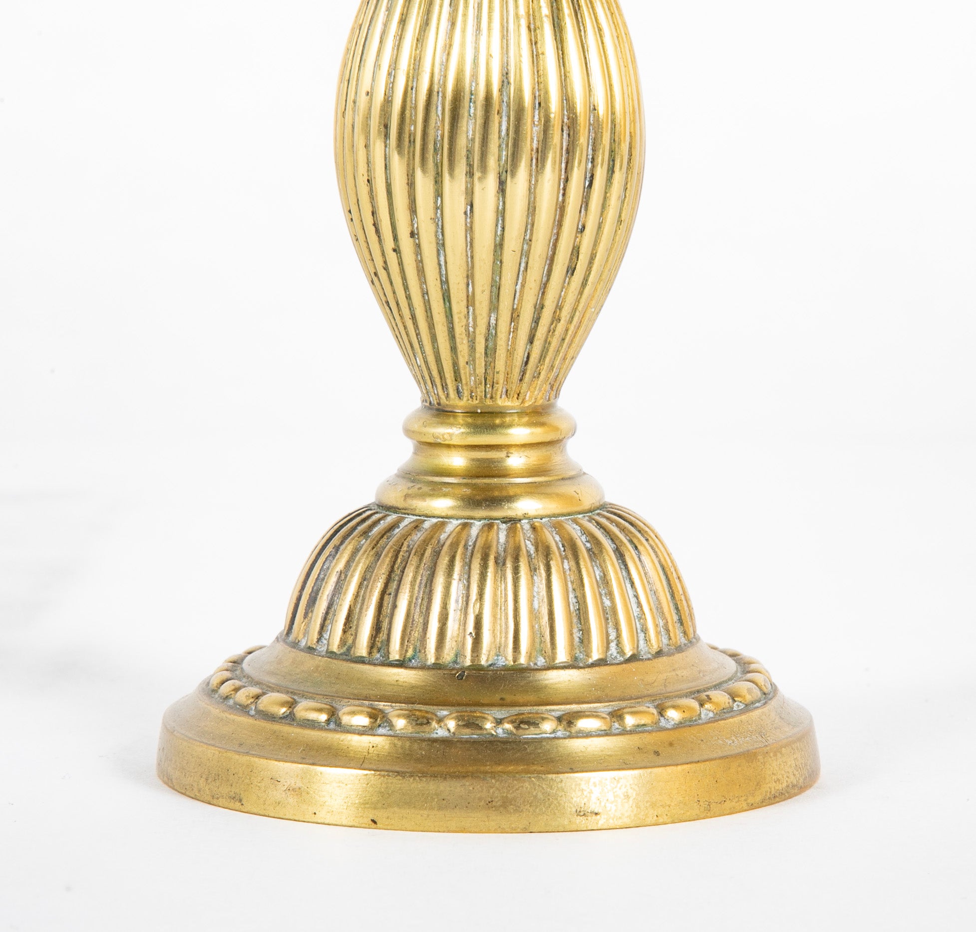 Pair of French Louis XVI Gilt Bronze Candlesticks