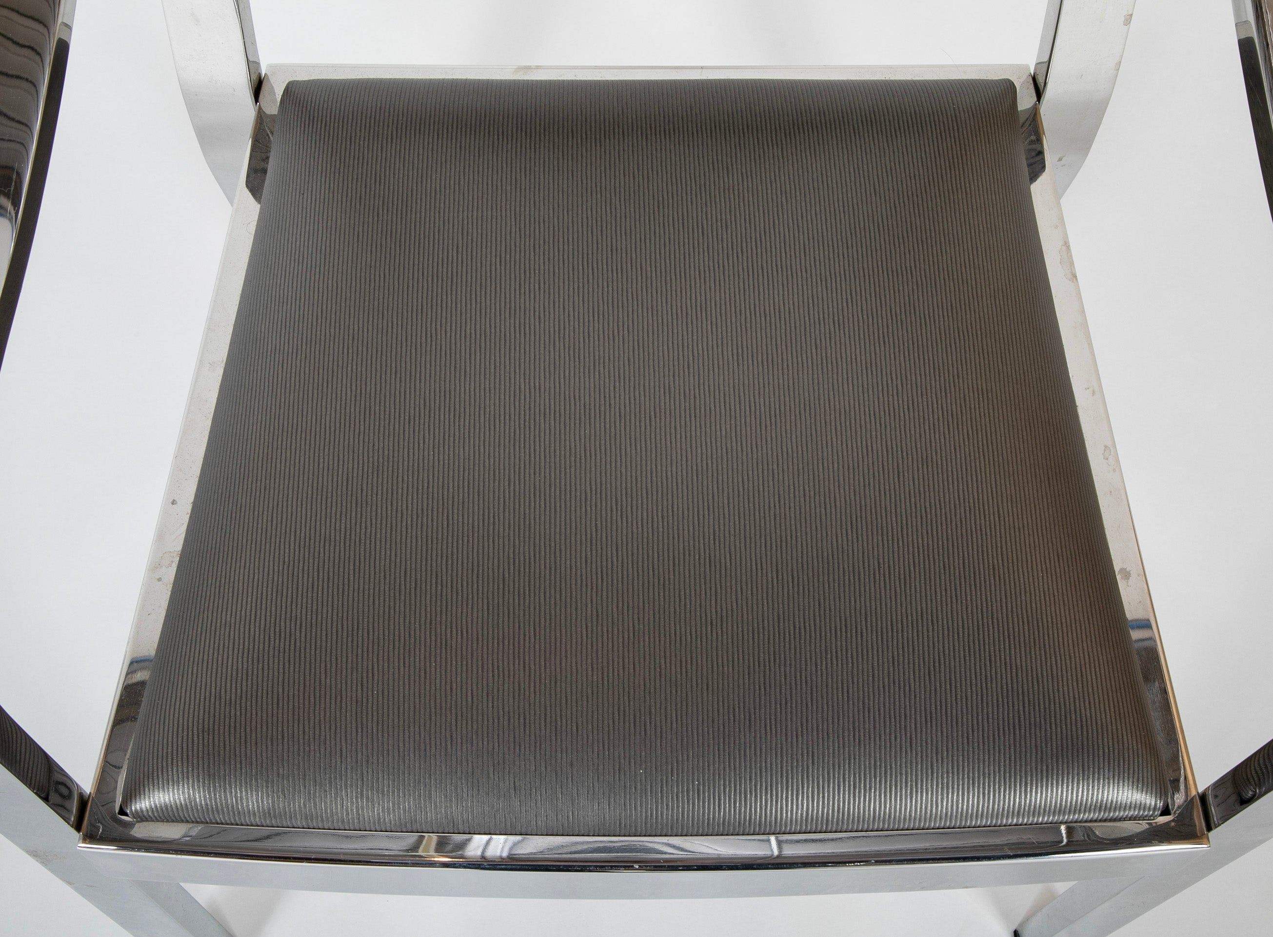 Pair of Karl Springer Armchairs in Polished Steel & Brass