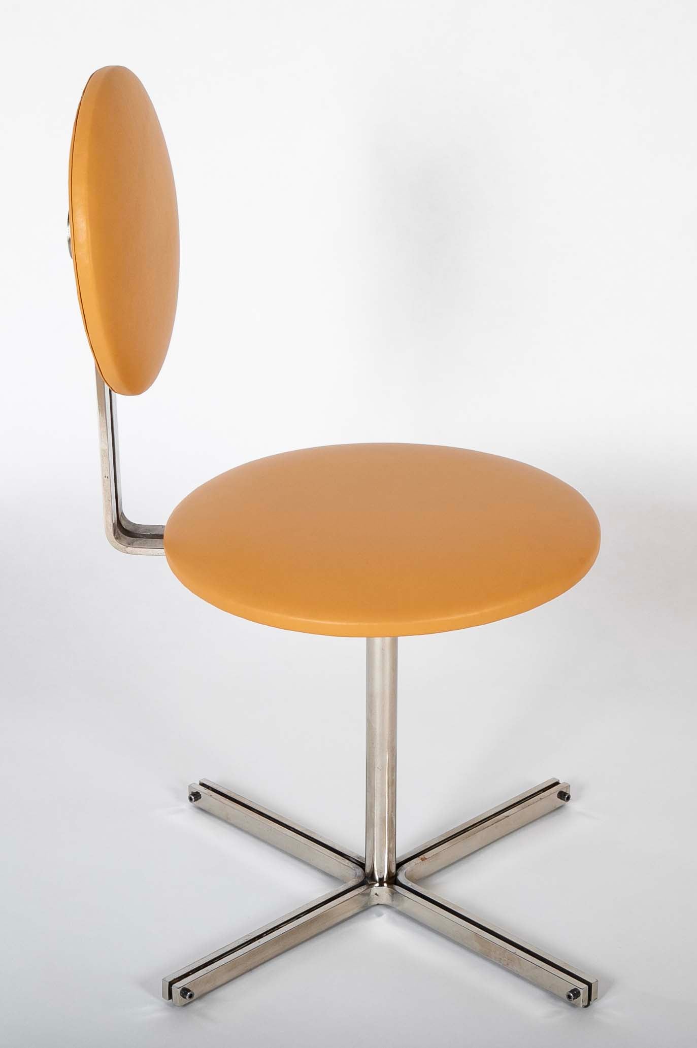 A Mid-Century Leather Upholstered Swirl Chair