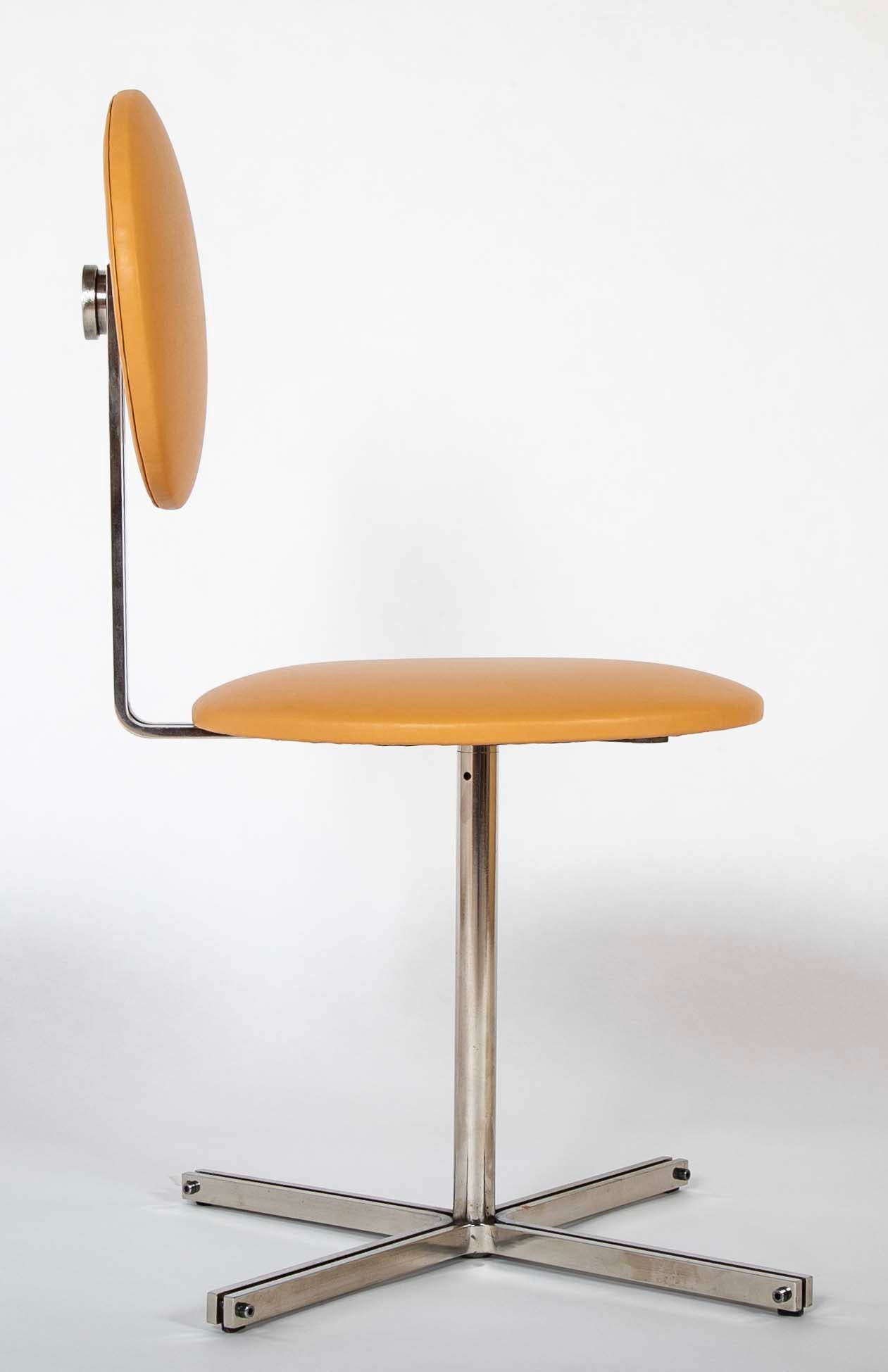 A Mid-Century Leather Upholstered Swirl Chair