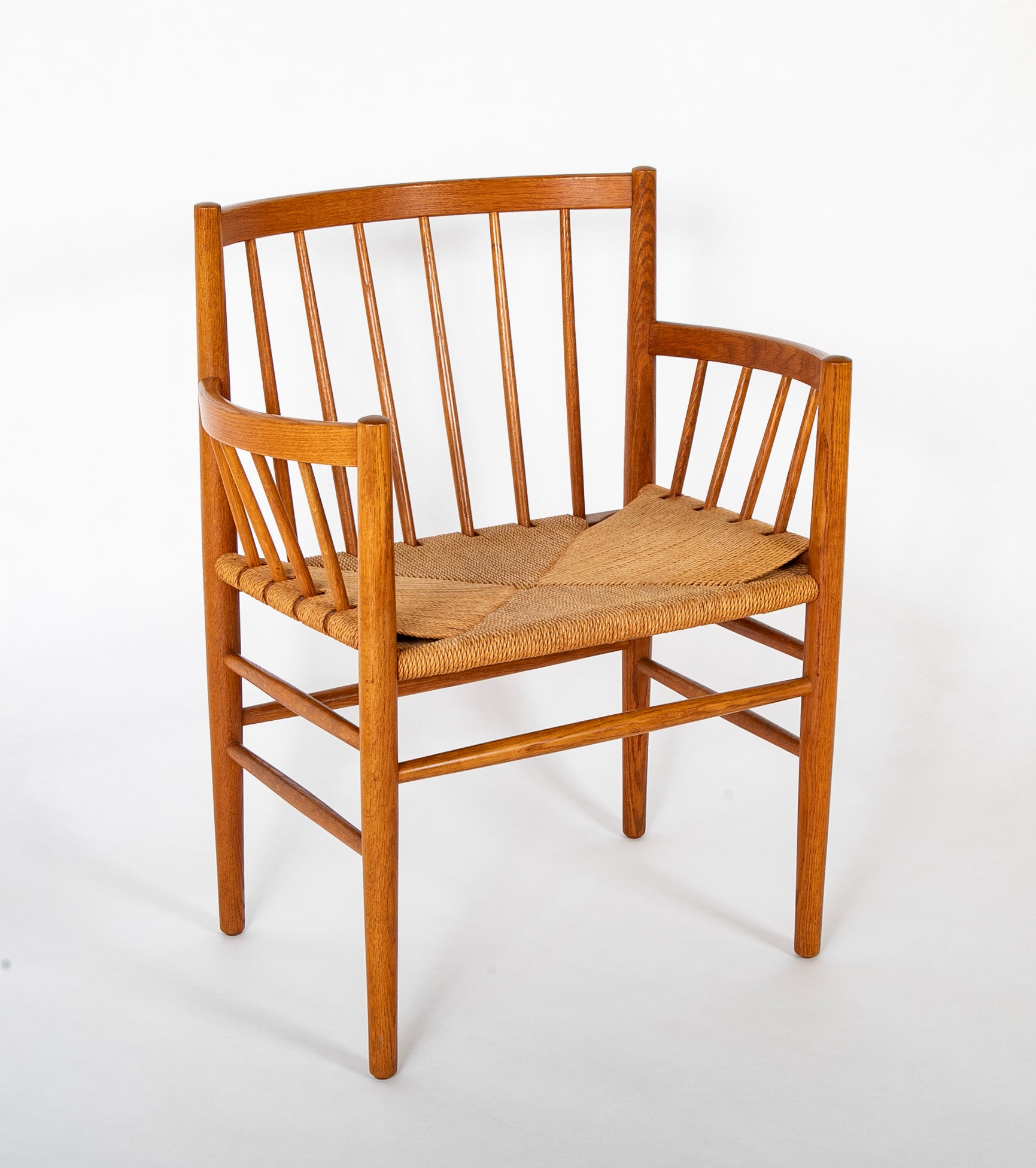 A Jorgen Baemark for FDB Mobler Oak Framed Armchair with Papercord Seat