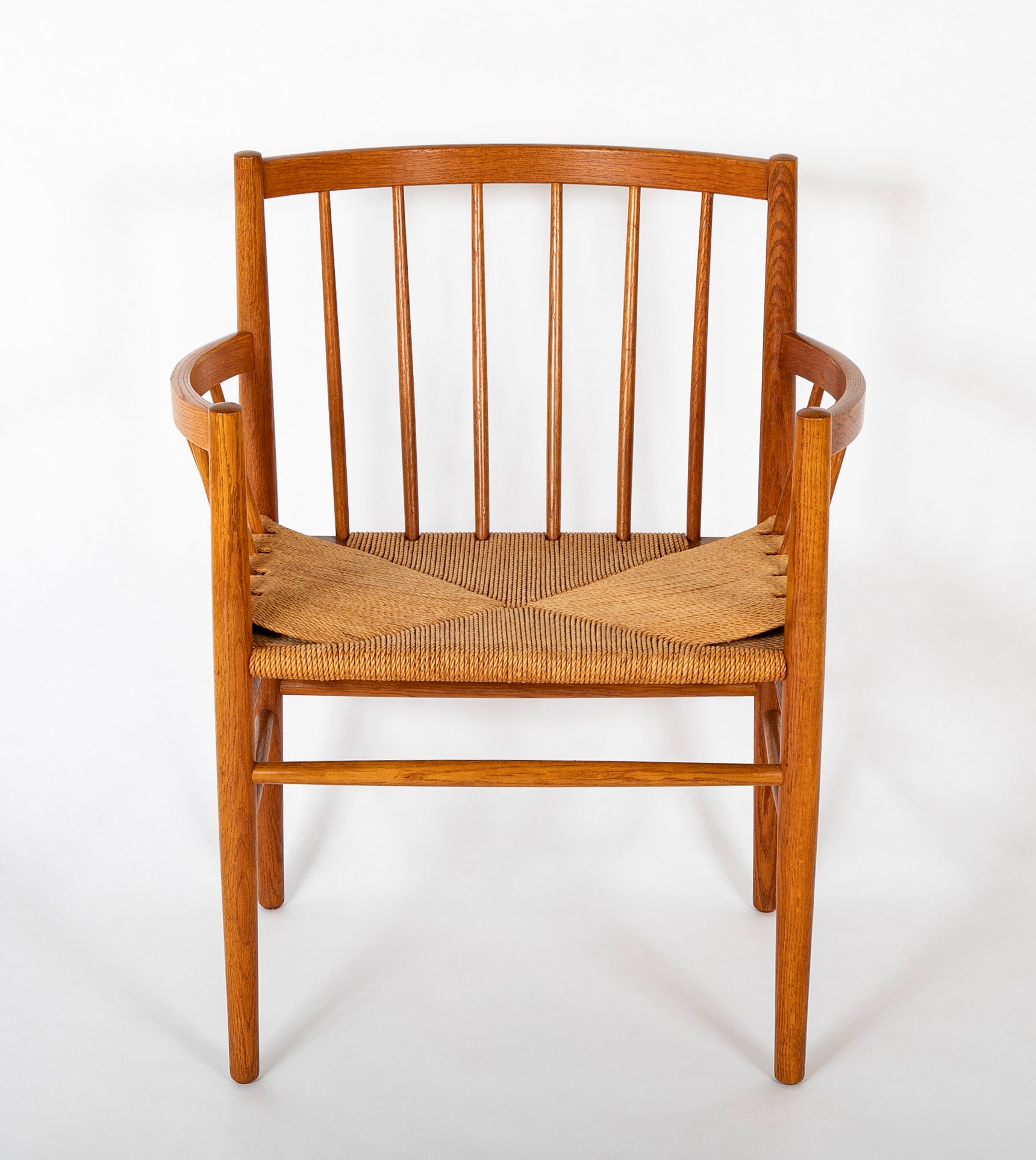 A Jorgen Baemark for FDB Mobler Oak Framed Armchair with Papercord Seat