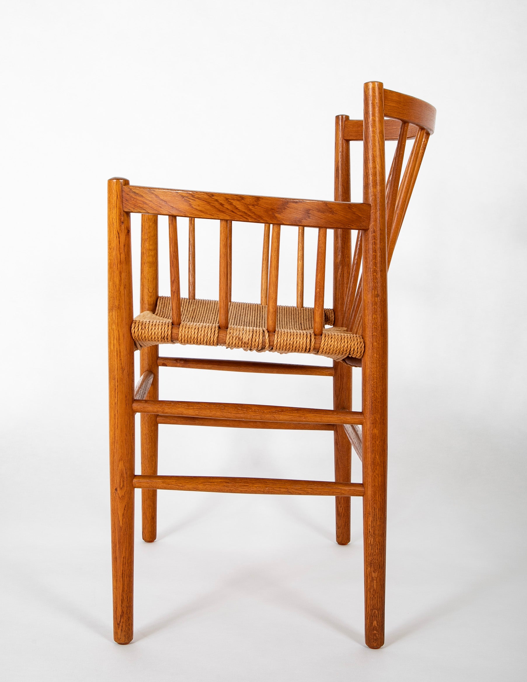 A Jorgen Baemark for FDB Mobler Oak Framed Armchair with Papercord Seat