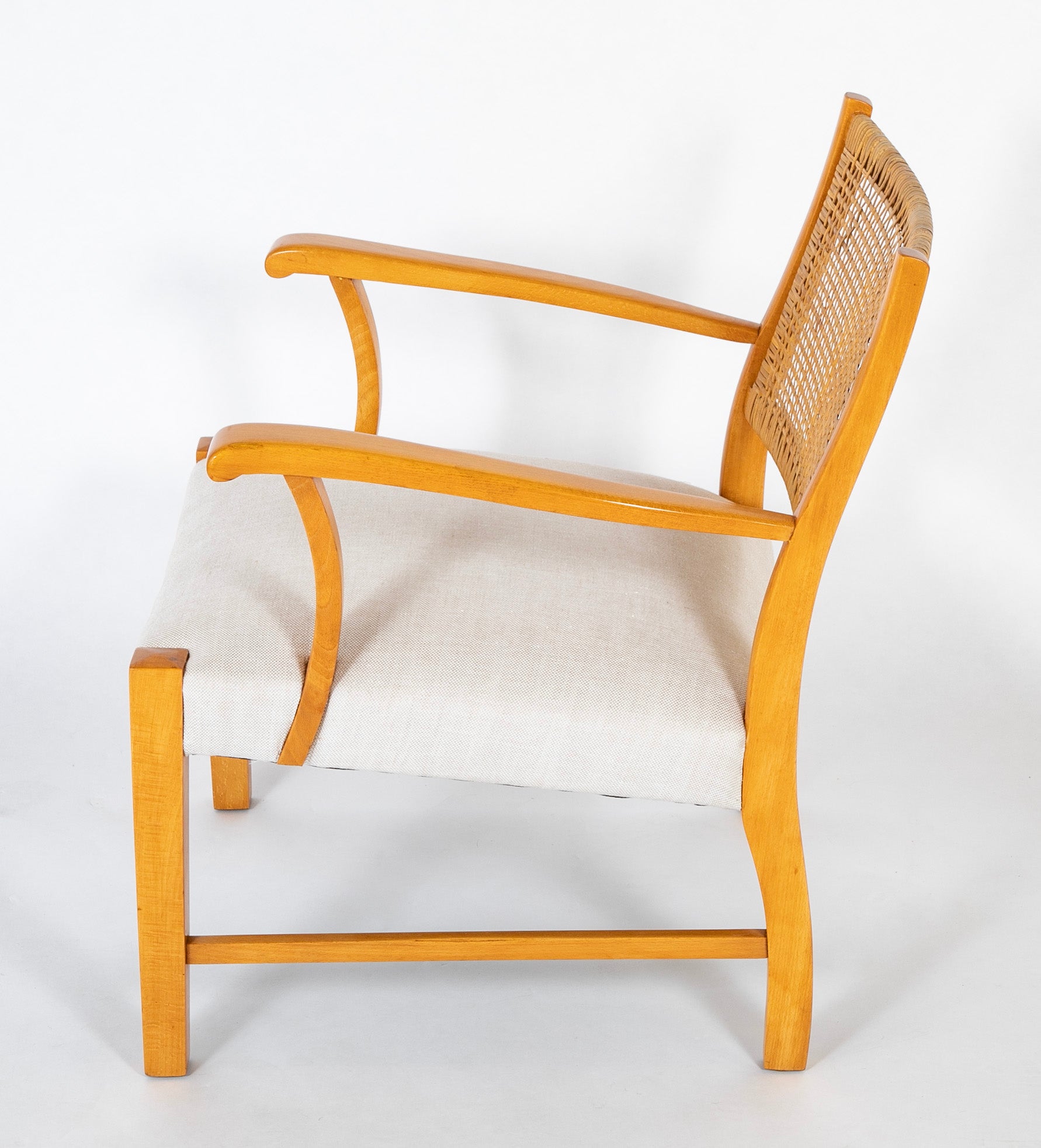 A Mid-Century Beech Frame Armchair with Caned Back