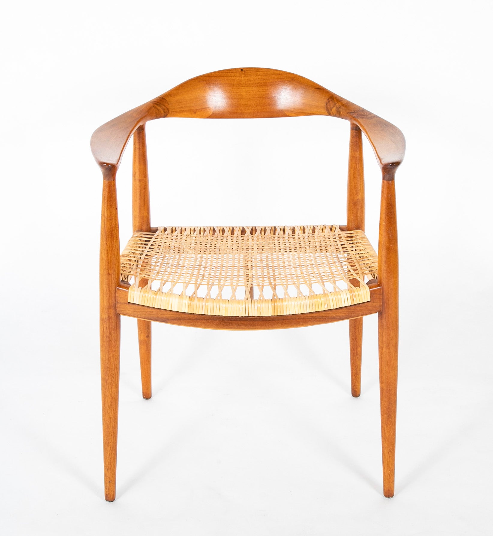 Four Danish Dining Chairs with Arms in the Style of Hans Wegner Priced Individually at $1,500 EACH
