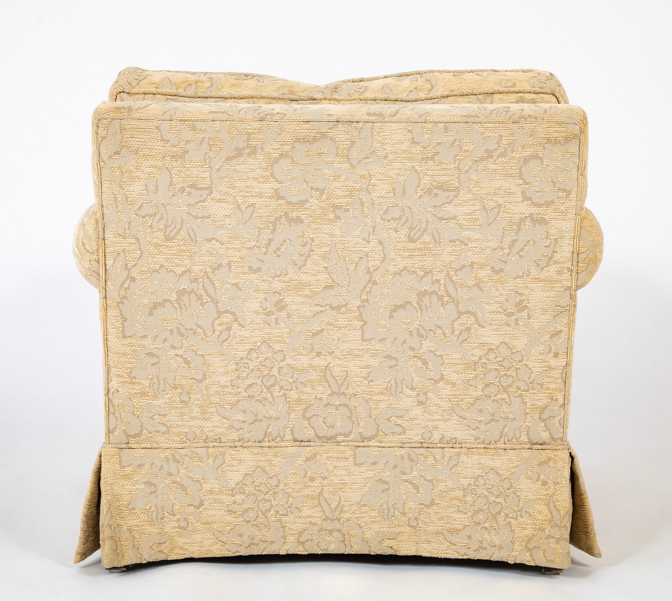 A Current Upholstered Armchair with Matched Ottoman